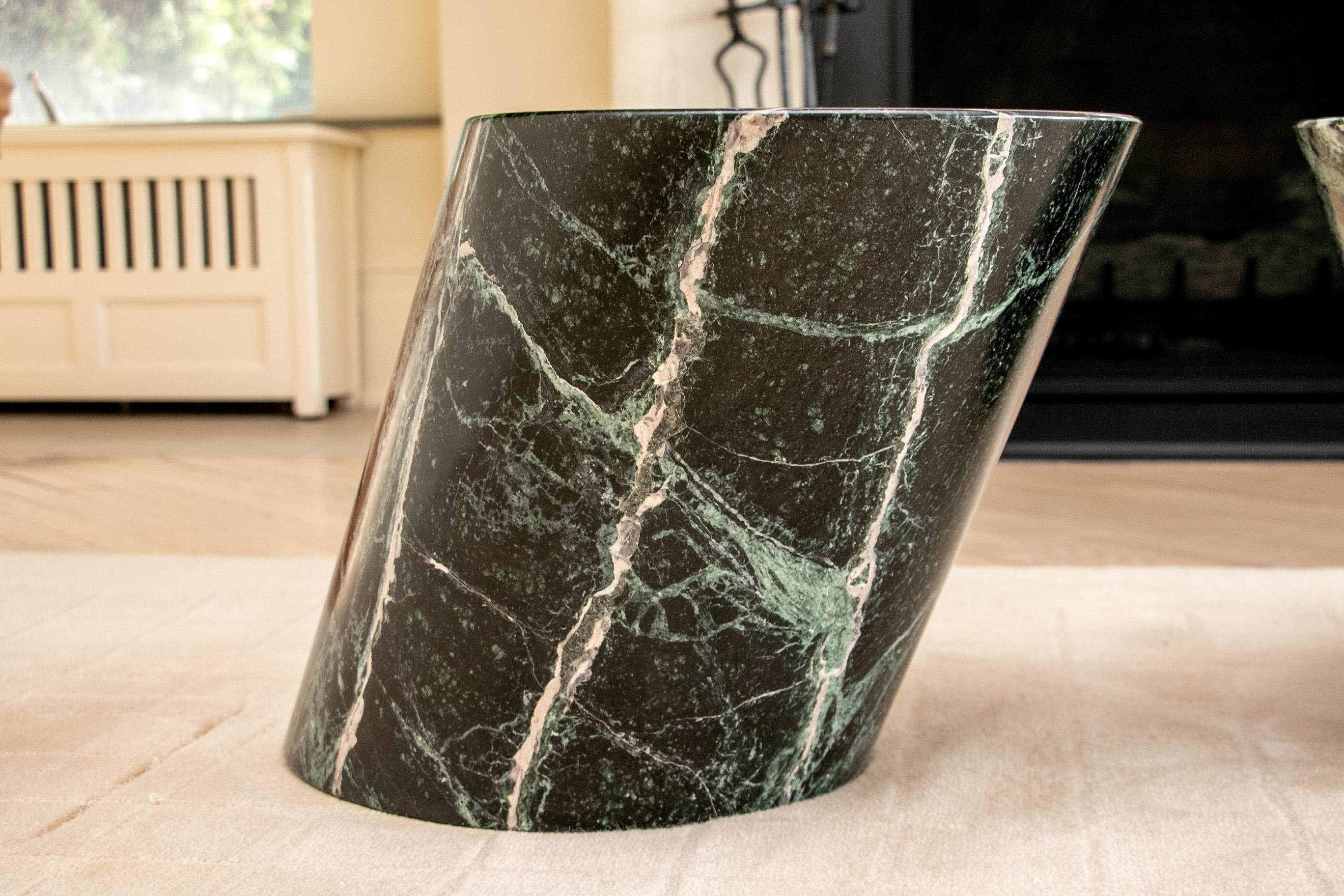 Pair of Minimalist modern green marble end tables, oval angled forms with flat tops and bases. Each cylinder weighs approximately 200 pounds each.


Condition: Good condition with light signs of use.