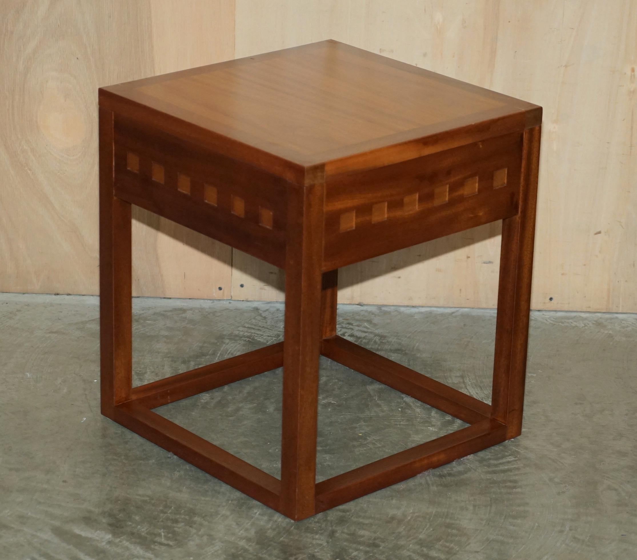 We are delighted to offer for sale this lovely pair of Cherry wood and teak side tables which are part of a set.

These are very well made and good-looking,the teak and cherry give them a nice natural feel.

The condition is very good, we have