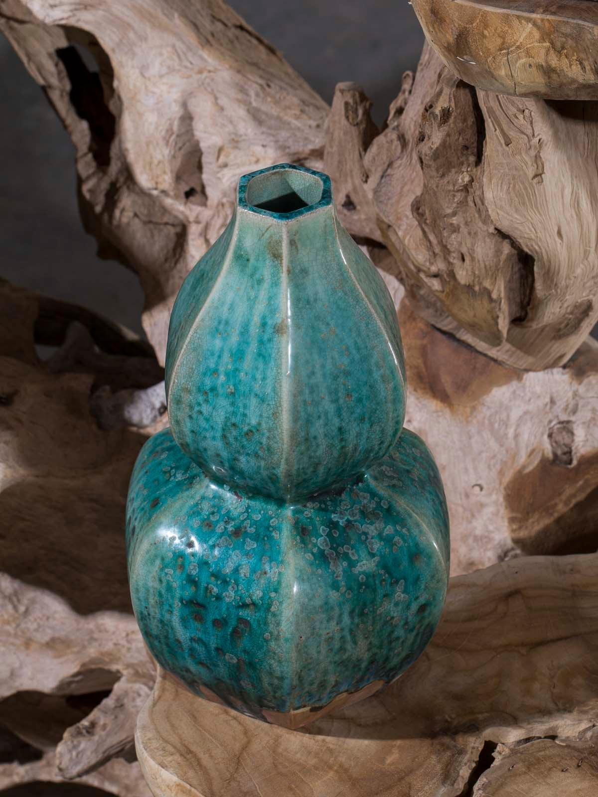 A pair of modern Chinese double gourd vases of hexagon shape with a hand applied green blue glaze covering the surface. These curious and beautiful vases feature a traditional Chinese shape known as a double gourd but done in a contemporary fashion