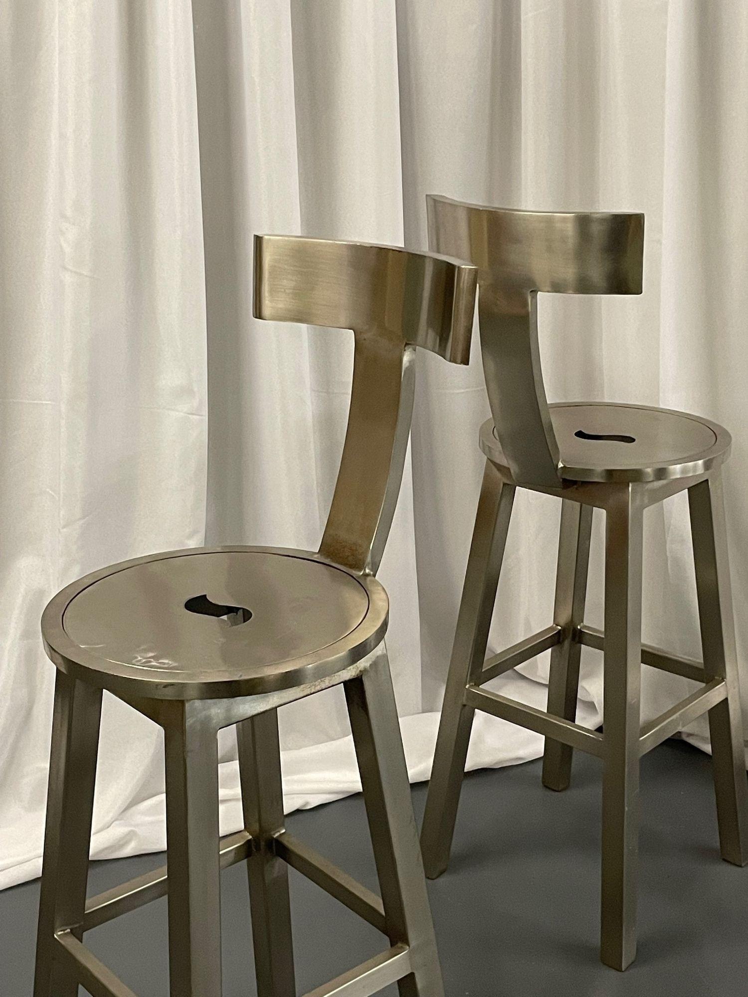 Pair of Modern industrial style steel bar / counter stools, organic form
 
Two (2) Industrial steel bar stools, high stools, or counter stools by an unknown American designer. 
 
Other American designers of the period include Adrian Pearsall,