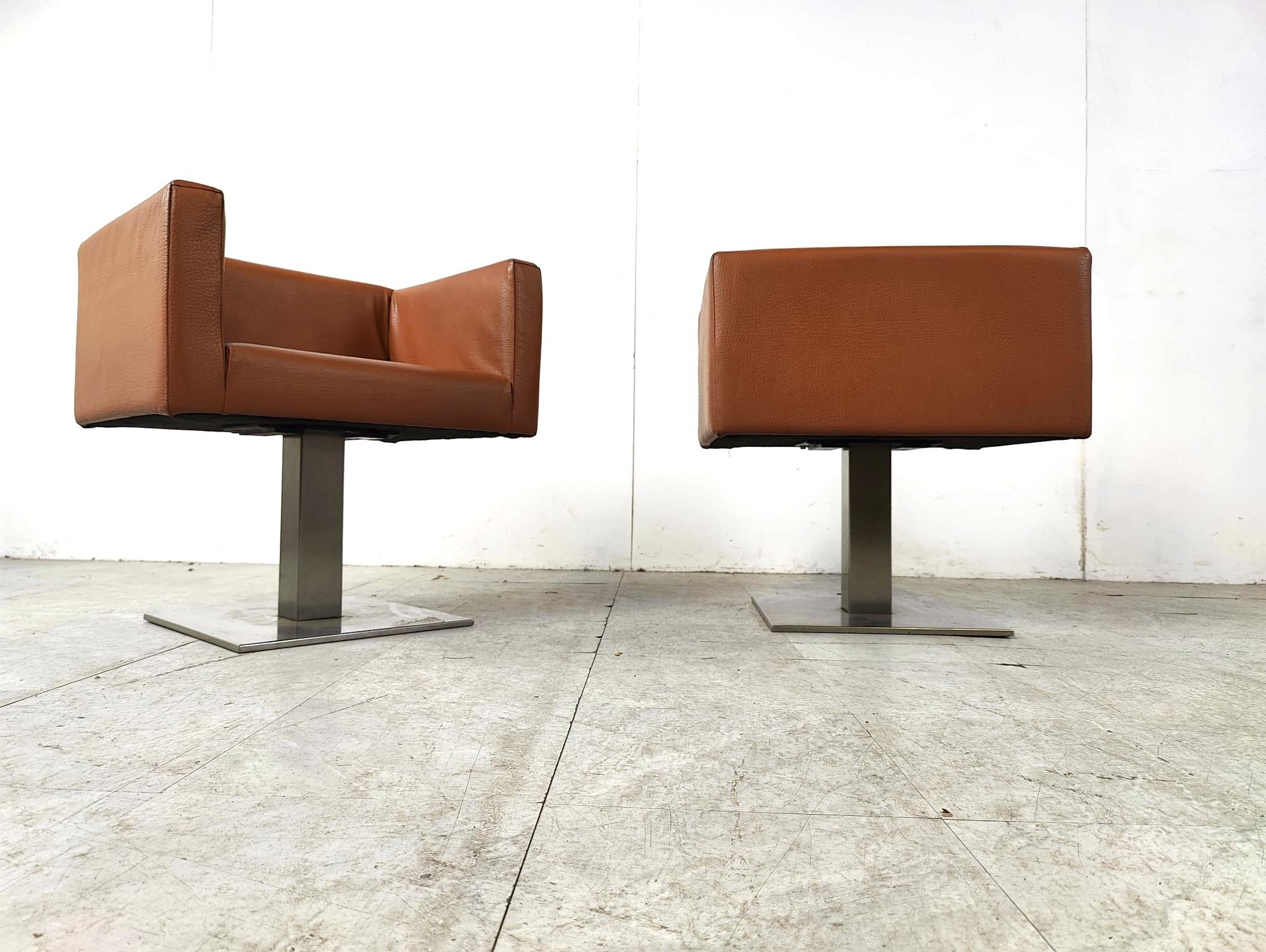 Modern Italian cognac leather armchairs with a chromed base.

Beautiful timeless design.

1990s - Italy

Height: 65cm
Width: 62cm
Depth: 50cm
Seat height: 44cm

Ref: 101233

*Price is for the pair