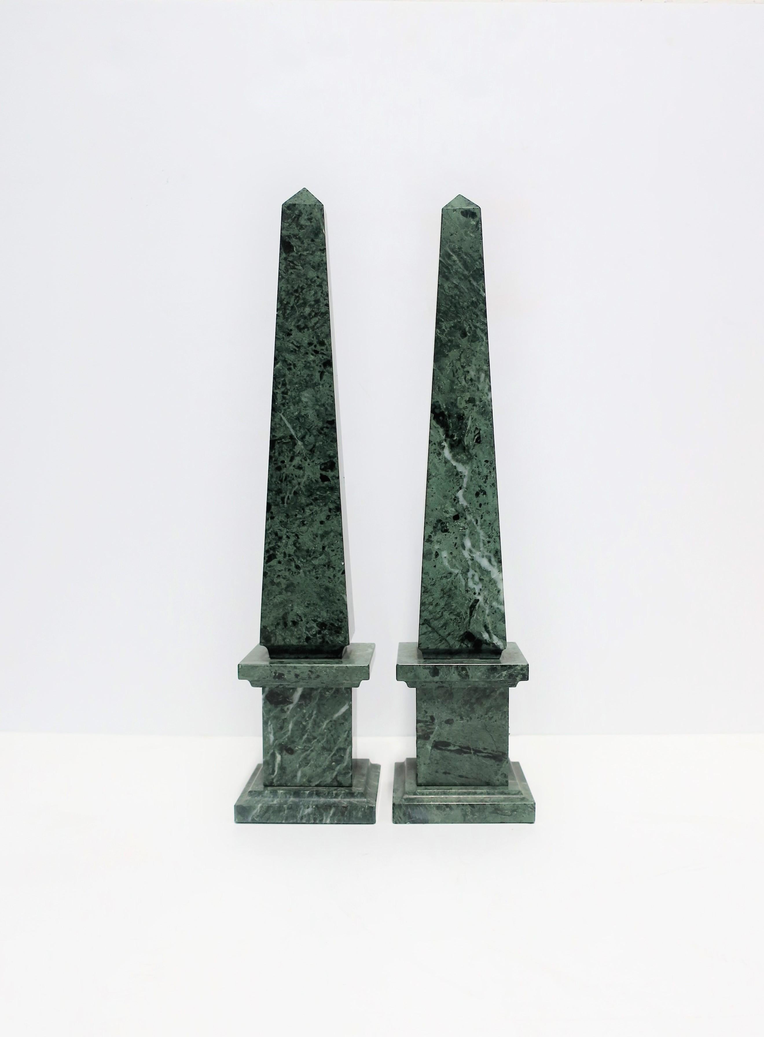 A beautiful and substantial pair of modern Italian green, black, and white, marble obelisks, circa mid - late 20th century, Italy.

Measurements: 3