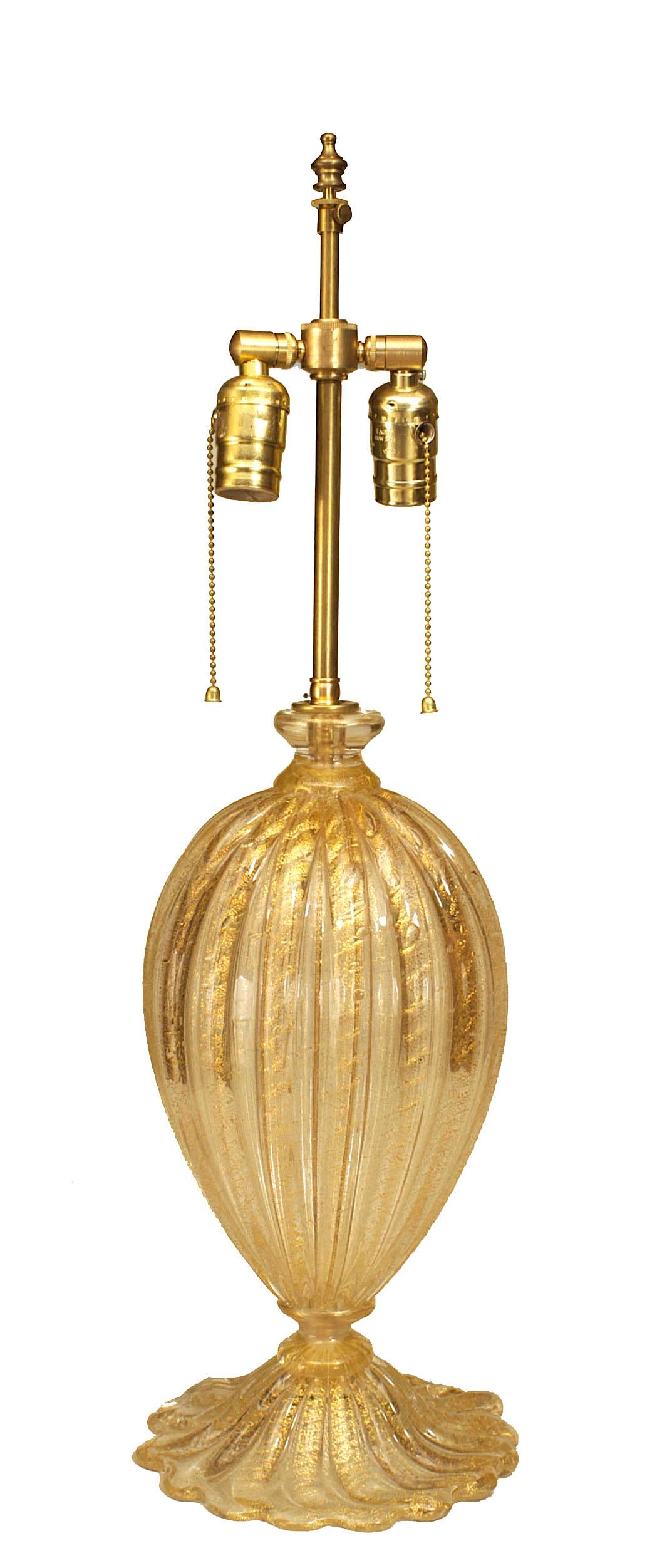 Pair of modern Italian Murano Cordonato gold dusted swirl glass table lamps with fluted designs and scalloped form bases.