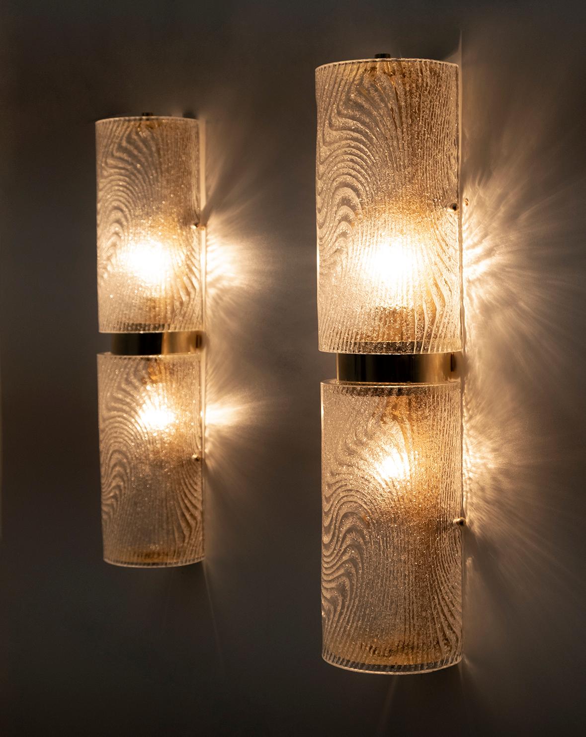 Pair of vintage Italian Murano glass sconces, produced by Murano Masters, each with two pieces of curved 