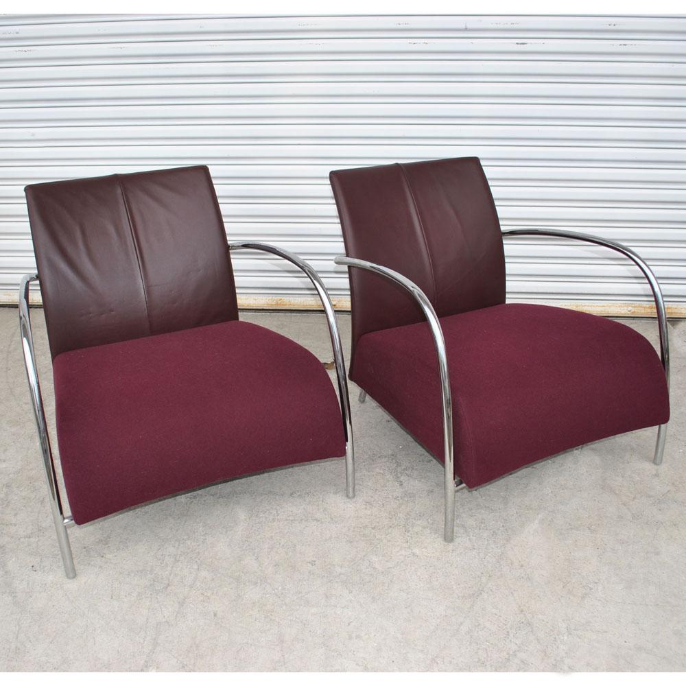 Pair of modern Italian style tubular chrome lounge chairs.
 

Pair of beautiful modern Italian style chrome tubular chairs. Zippered leather backs with raspberry mohair seats.