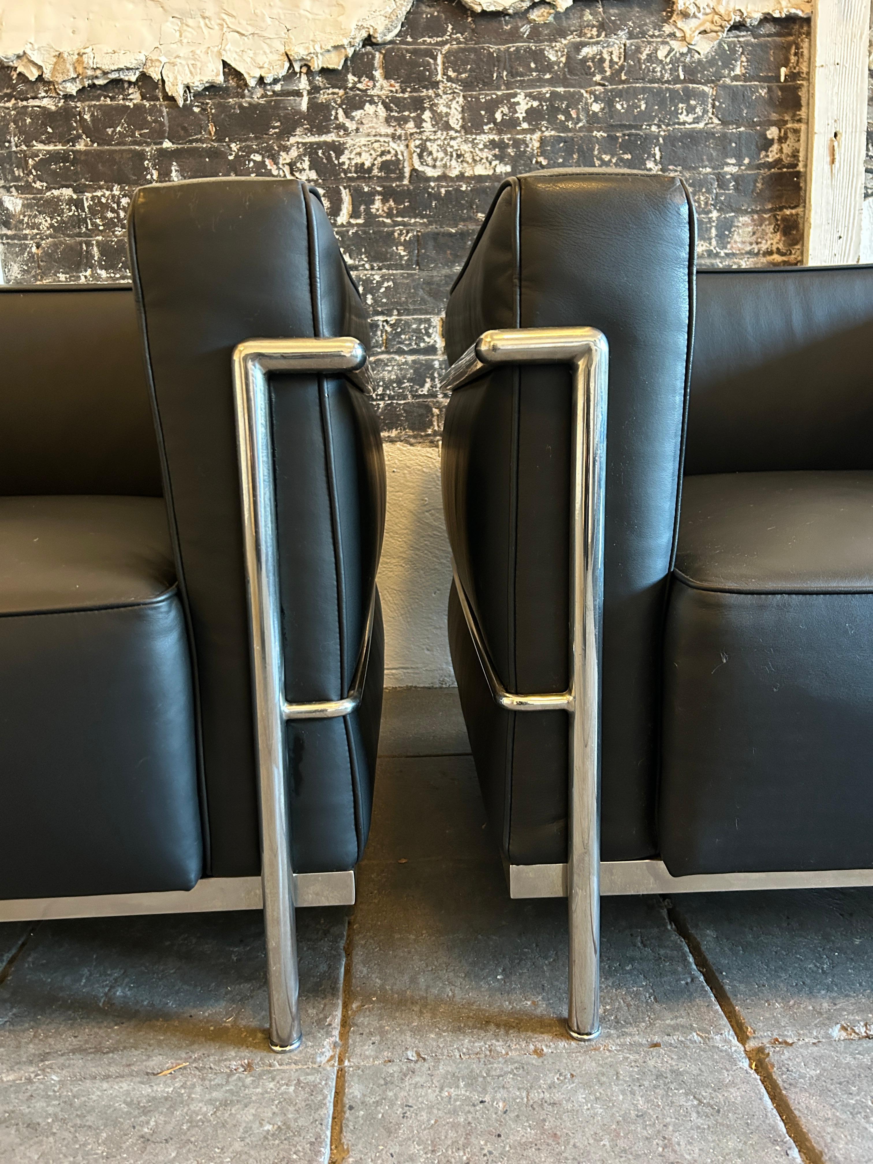 Pair of Modern LC3 Black leather chrome frame lounge chairs by Le Corbusier 2