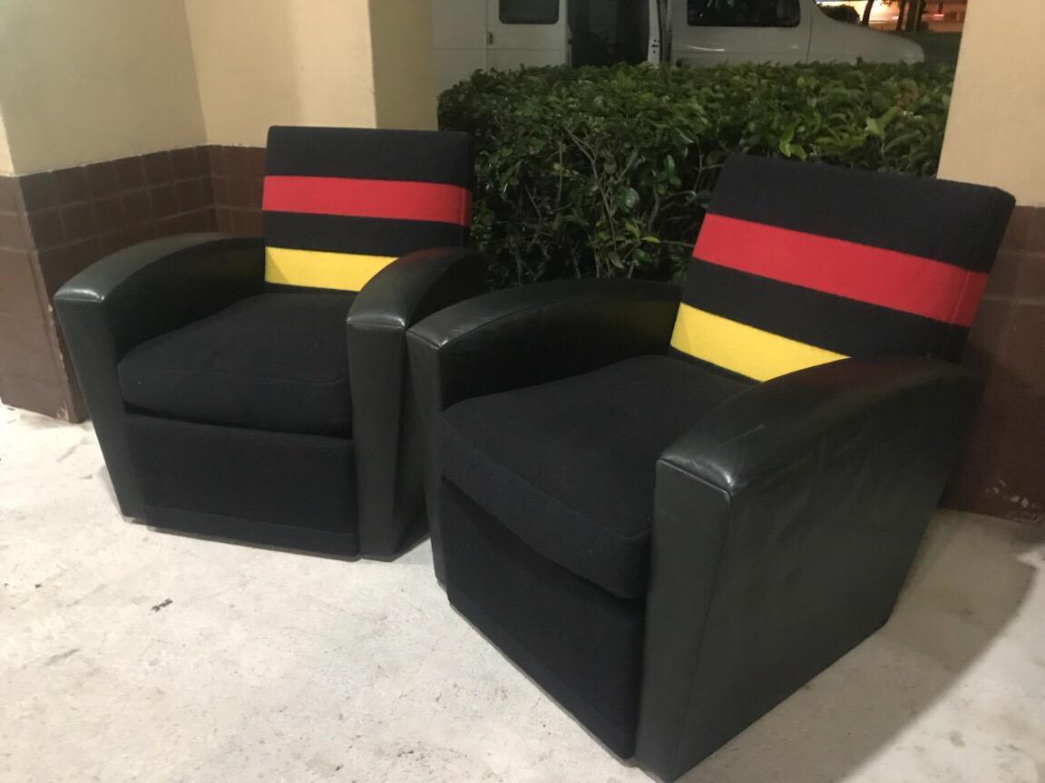 Pair of modern leather and striped wool swivel chairs, each one substantial and comfortable swivel chair
Measure: Arm height 25