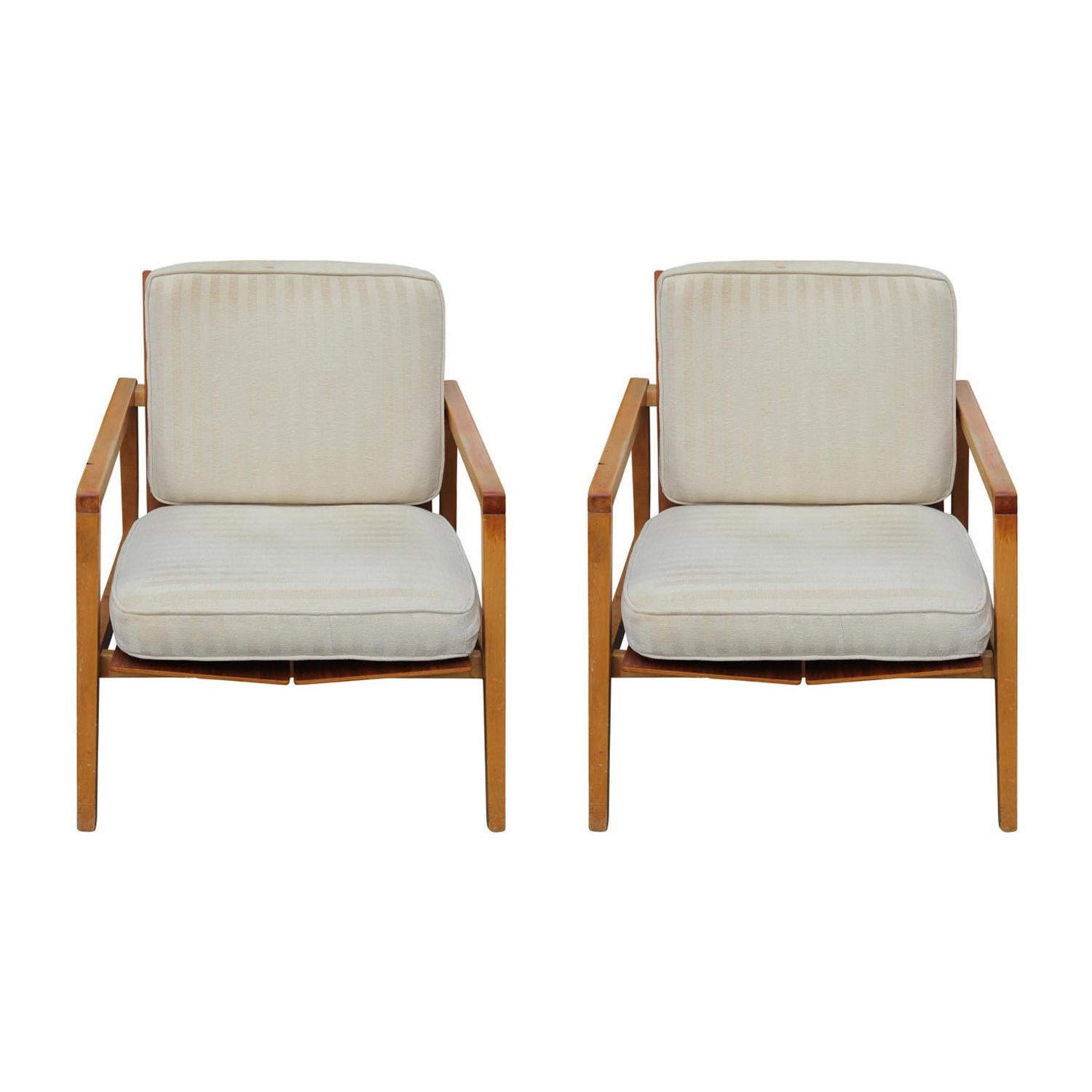 Pair of upholstered Model no. 655 lounge chairs raised on amaple frame with walnut seat and back supports. Designed by Lewis Butler for Knoll, circa 1955. Re-upholstery is suggested.
 