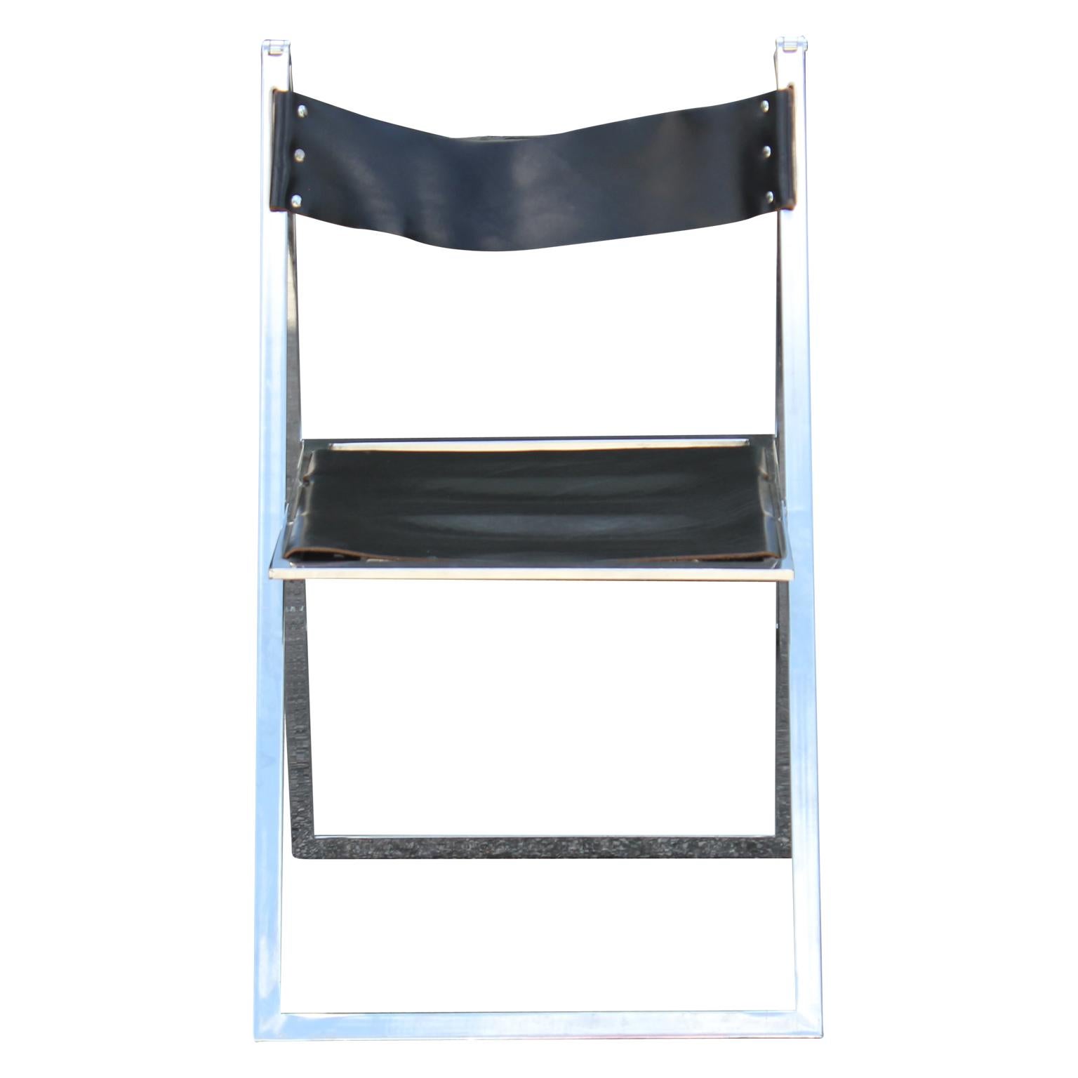 Pair of gorgeous black leather folding chairs by Lübke with a chrome 