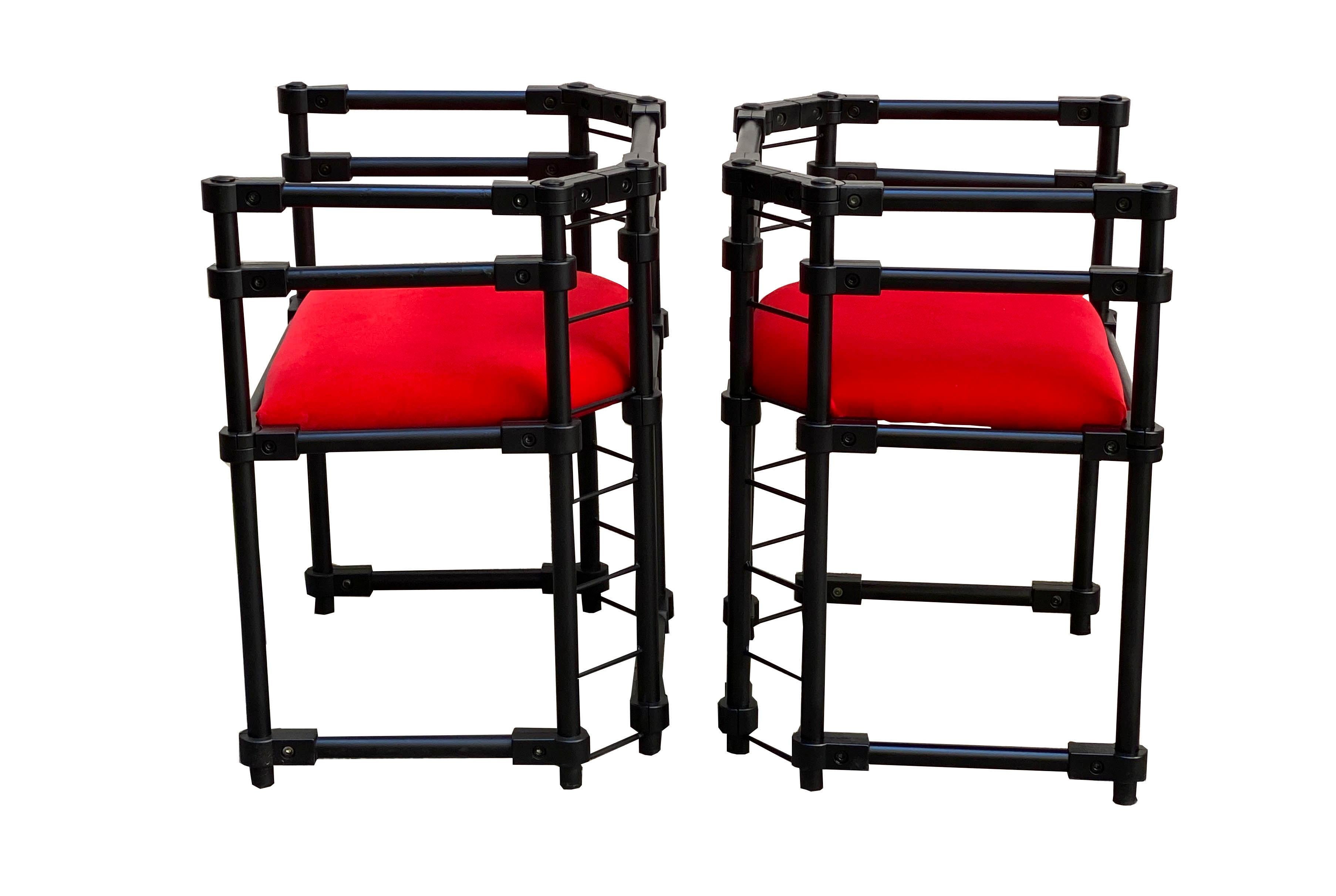 Pair of modern armchairs with black painted metal frame and red velvet seat, the armchairs are wide and comfortable seating, suitable for both office and dining table.
 