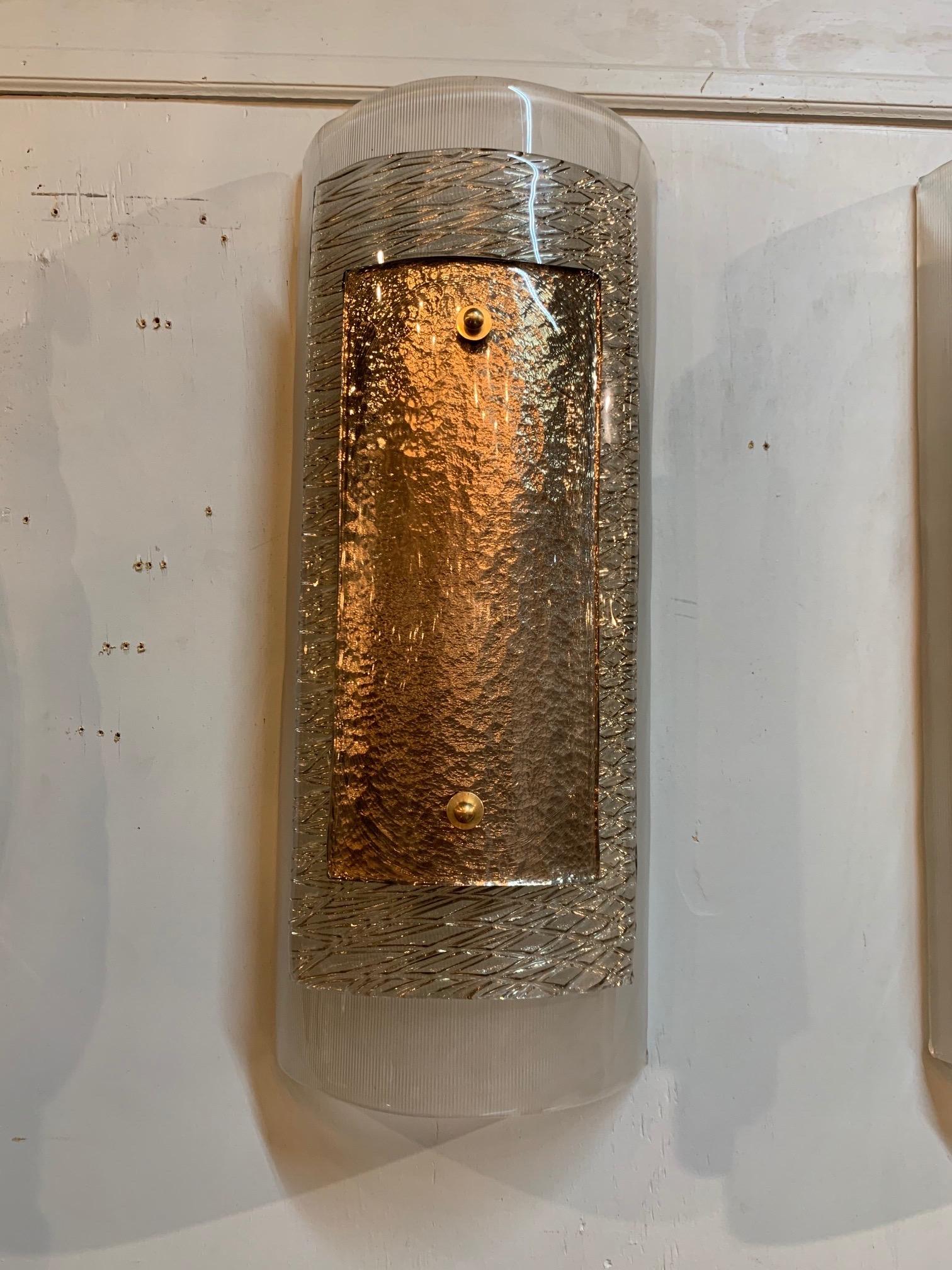 Gorgeous pair of modern Murano glass wall sconces. These have 3 layers of glass each with a different color and texture. Very special!!