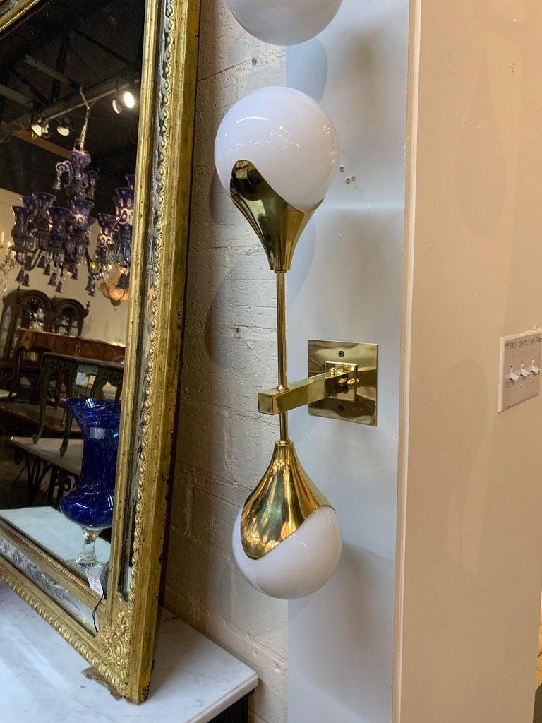 Contemporary Pair of Modern Murano Gilt Brass and White Glass Ball Form Sconces For Sale