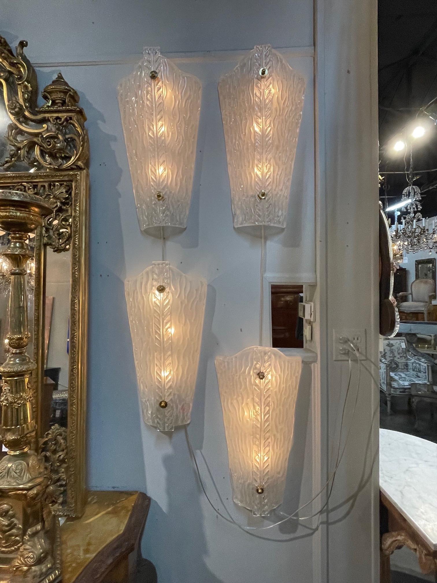 Beautiful pair of modern Murano glass sconces with textured glass. Very Fine quality and so pretty!!
Note: There are currently 2 pairs available.