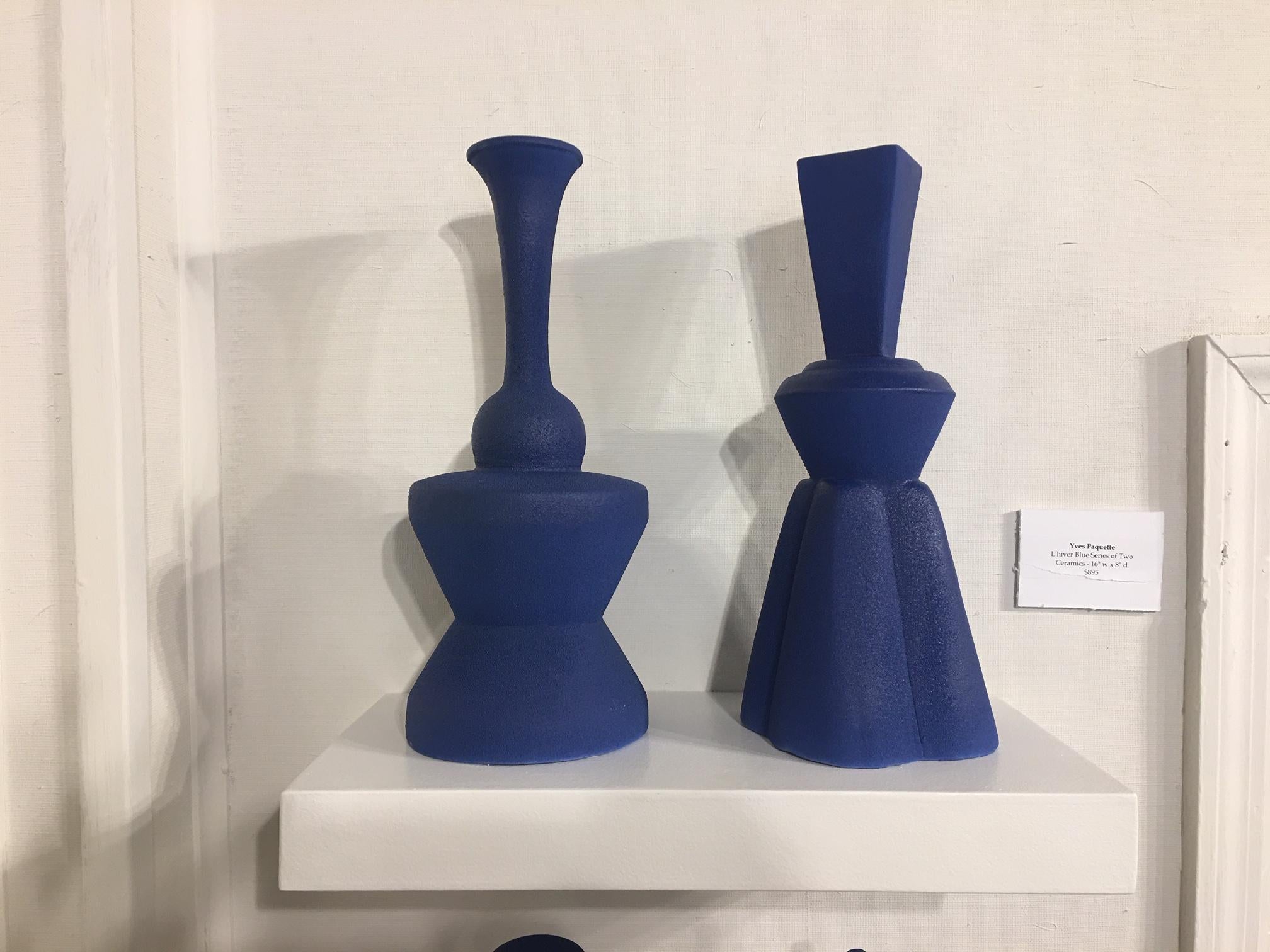 Pair of modern Pantone color fine ceramic objects of art by Yves Paquette on a floating shelf. L'hiver Blue Series of Two

Yves Paquette - 