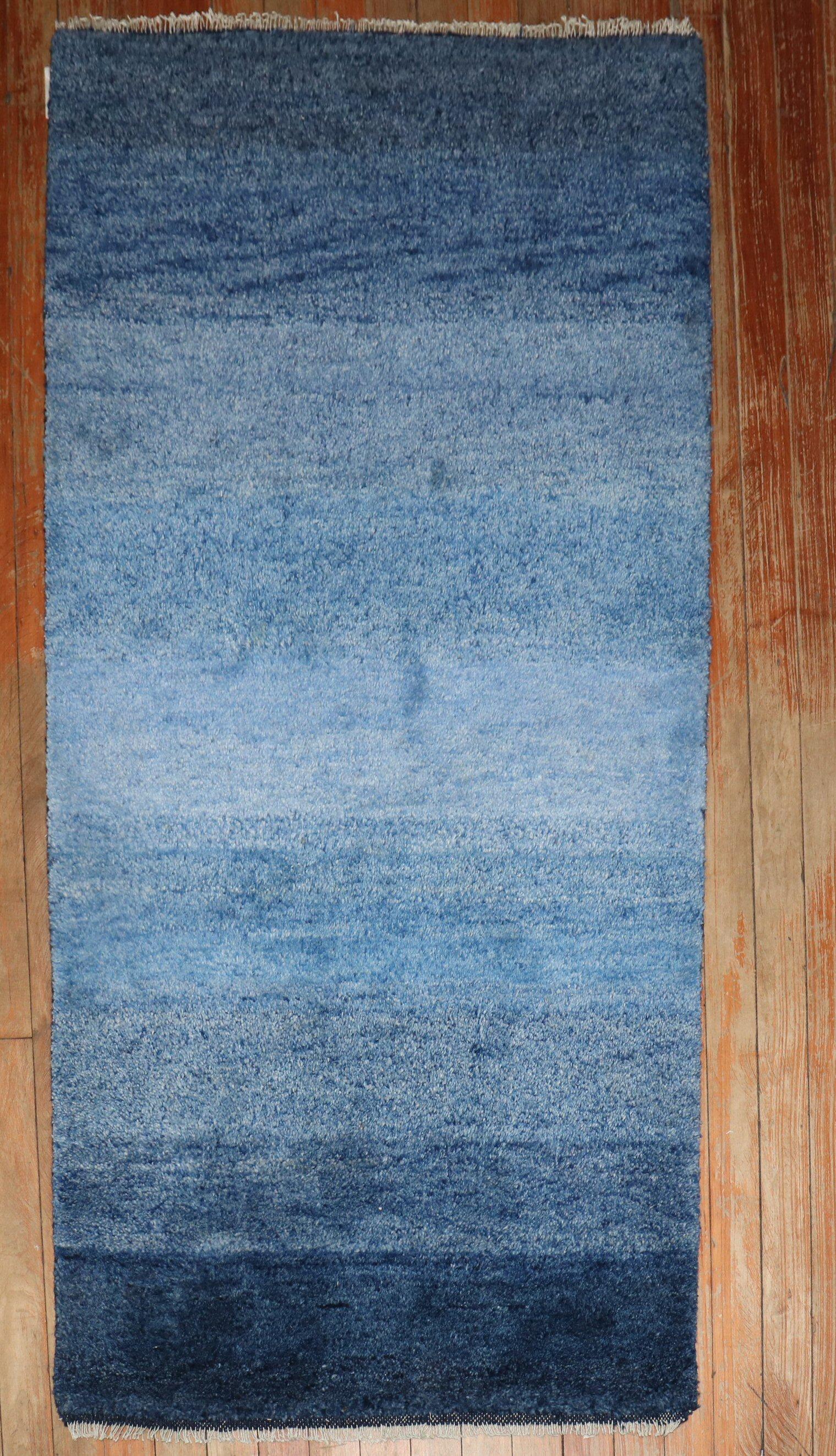 A set of scatter-size Modern Persian Gabbeh rugs 

Measuring 2'5'' x 4'7'' & 2'5'' x 4'9'' respectively.