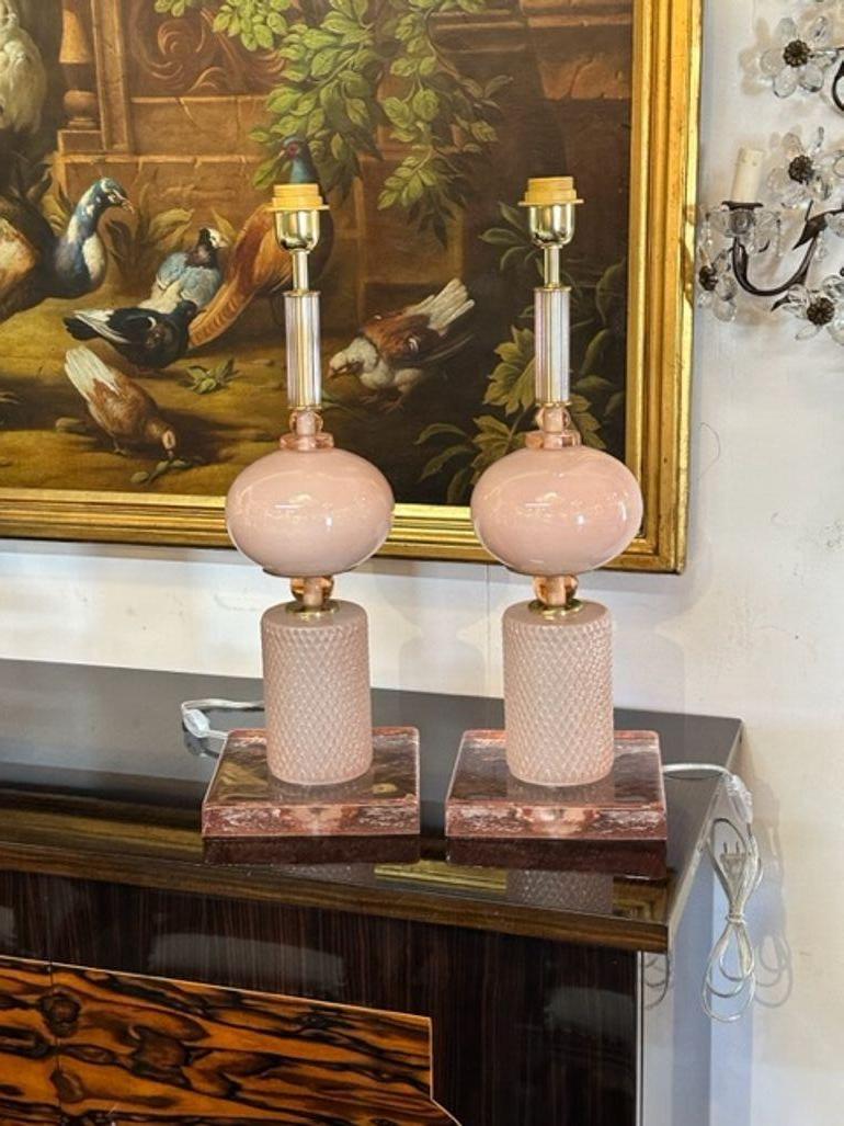 Pretty pair of Modern Murano glass lamps with various components and shades of pink. A nice touch to complete your decor!