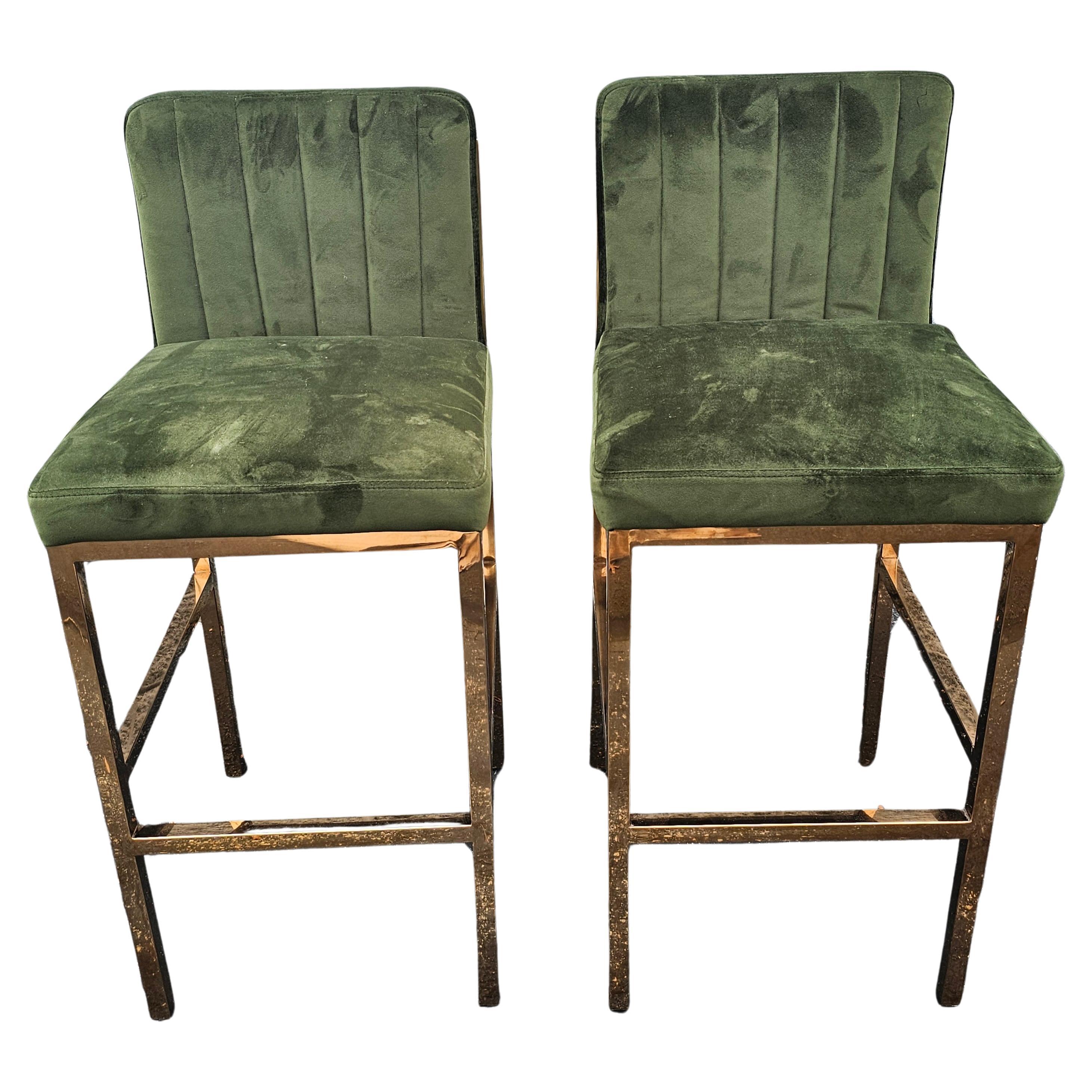 A beaitiful pair of modern polished brass frame and velvet upholstered barstools .
very comfortable. Measure 17.5