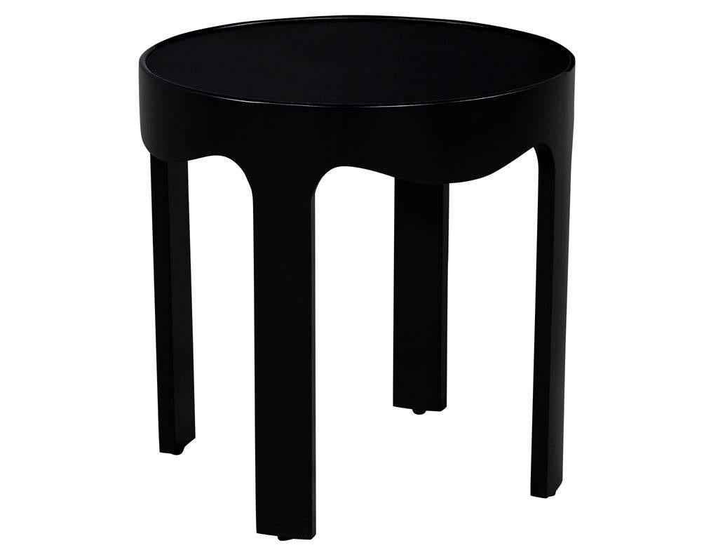 Pair of modern round black side tables. Sleek contemporary design and satin black wood finish.

Price includes complimentary curb side delivery to the continental USA.