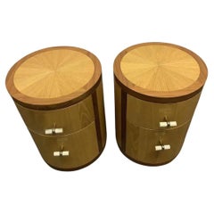 Pair of Modern round cylinder blonde oak 2 drawer nightstands with white handles
