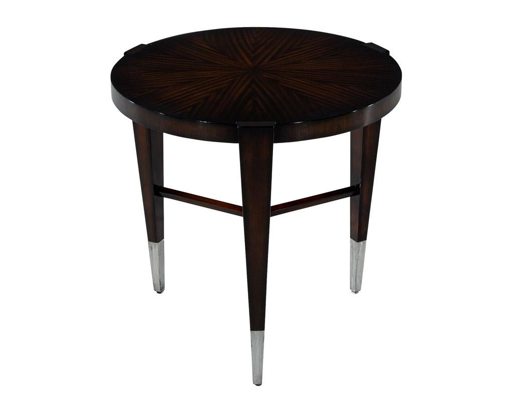Introducing the perfect addition to your modern home, the Jacques Garcia for Baker Furniture round macassar accent table. Crafted with exquisite attention to detail, this stunning piece showcases the natural beauty of macassar woodgrains in a rich,
