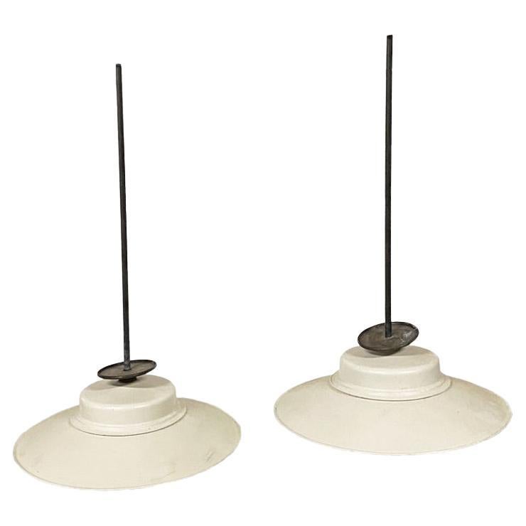 Pair of Modern Saucer Fixtures For Sale