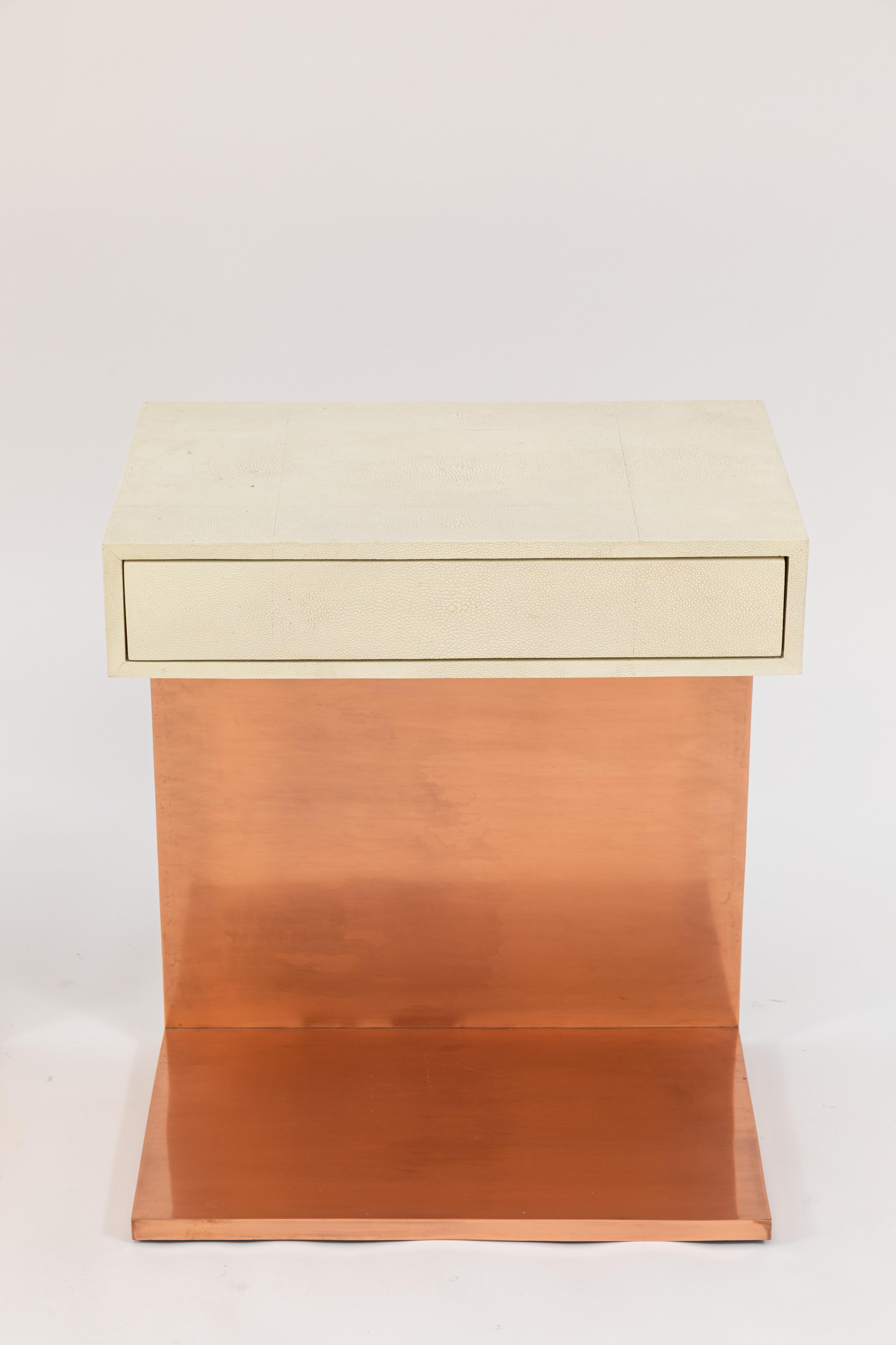 Pair of modern single drawer side tables with white shagreen tops and copper finish.
