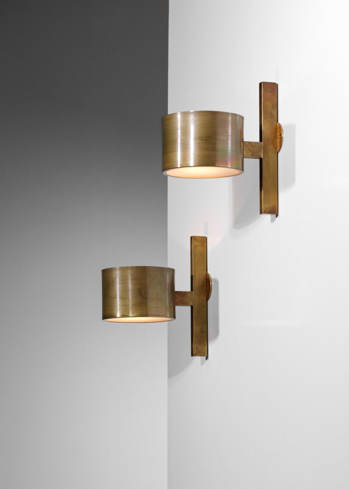 Modern Italian wall lights in the taste of Hans Agne Jakobsson's work. Structure and cup in solid brass and frosted glass disc. Excellent condition (modern creation), quantity on request.