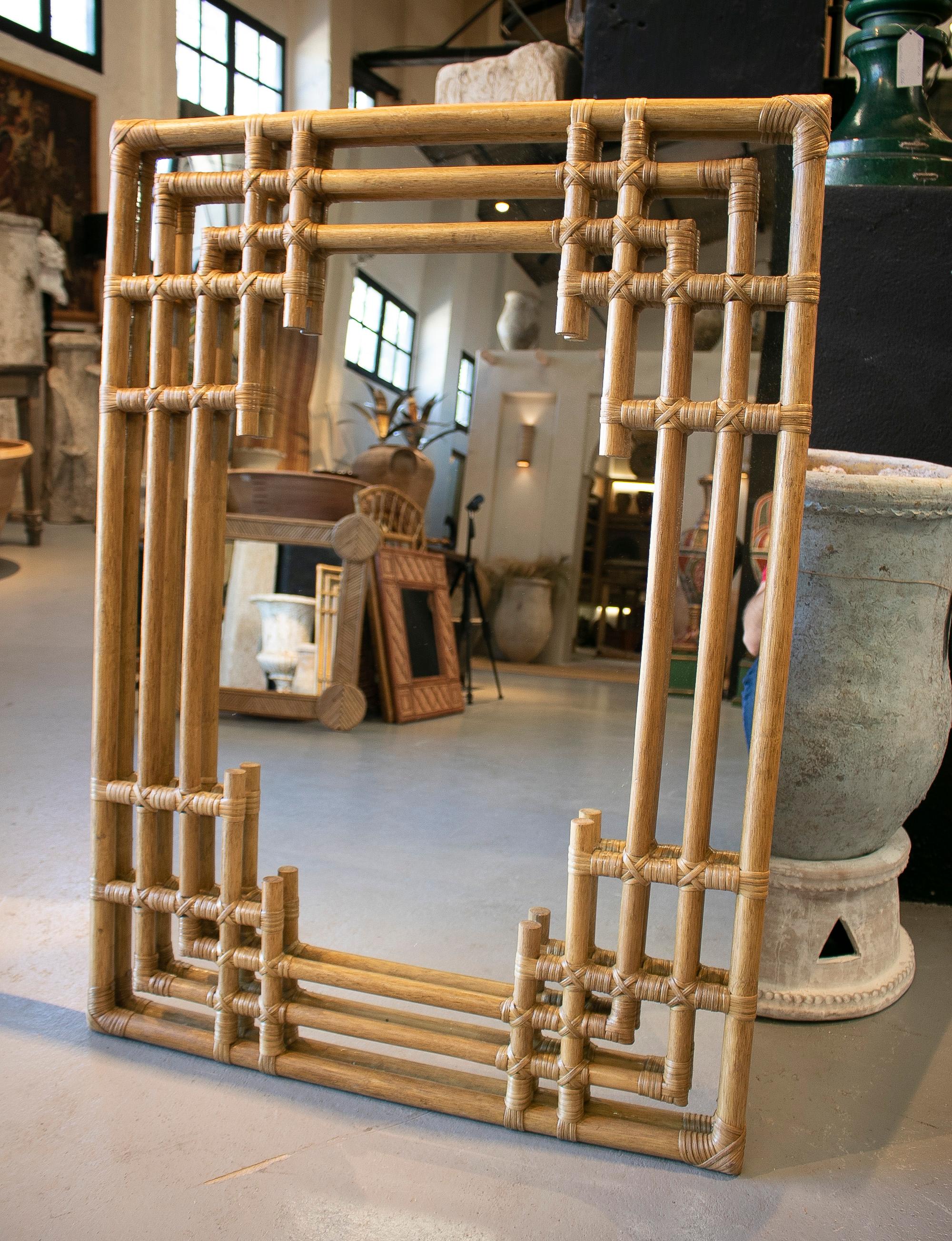 Pair of modern Spanish handcrafted square bamboo wall mirrors.