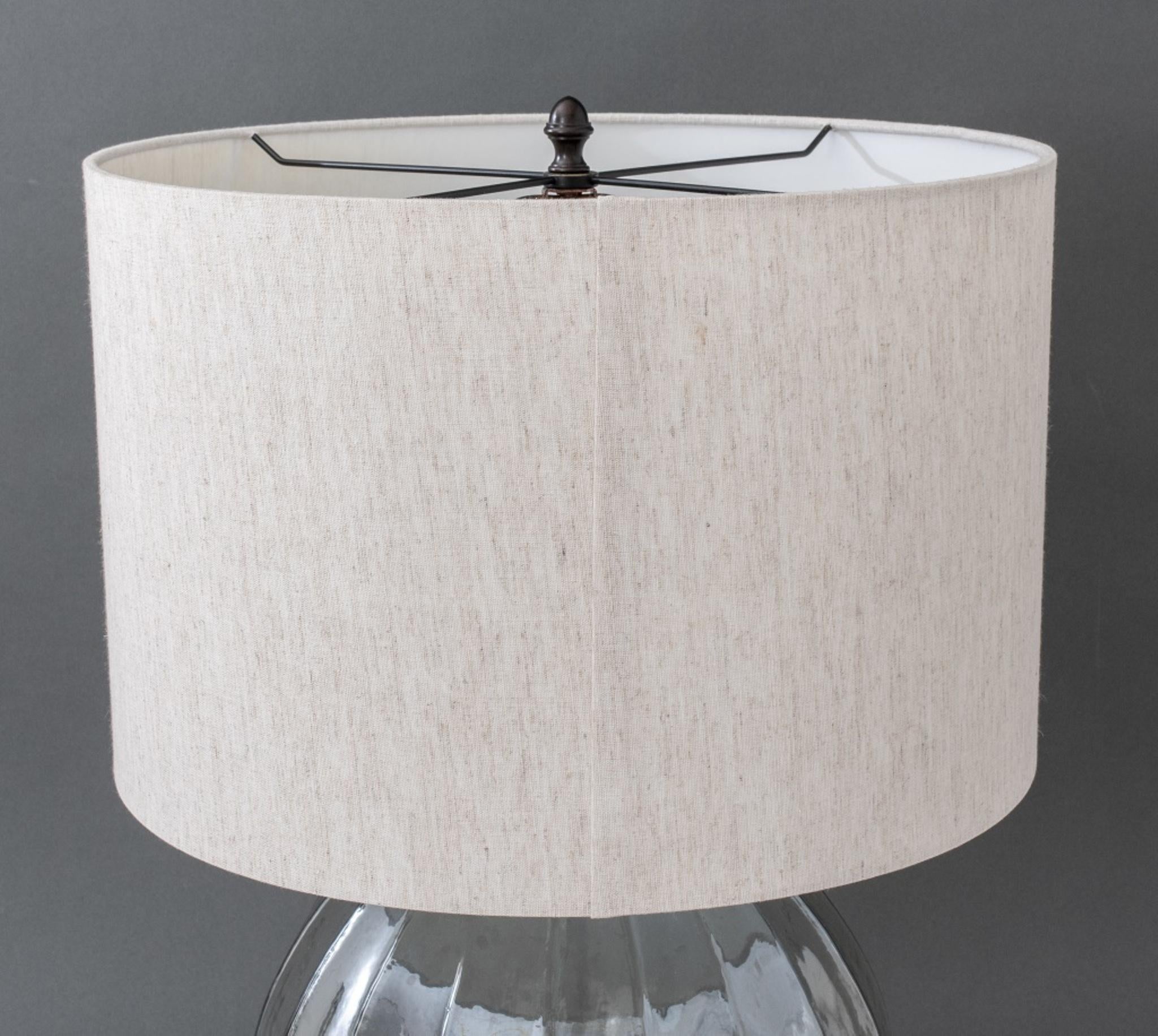 Pair of spherical iridescent glass table lamp with beige shade. Lamp: 25