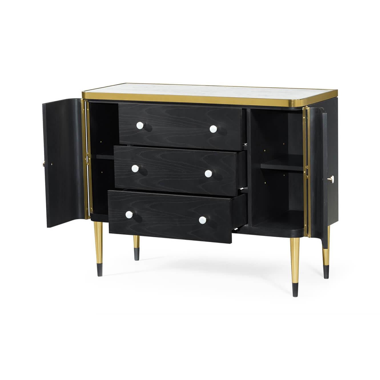 A pair of Mid-Century Modern style storage chests with white marble top, brass trims and panels, and ebonized drawer fronts. The end doors open to reveal interior shelf storage and raised on tapered legs.

Dimensions: 48