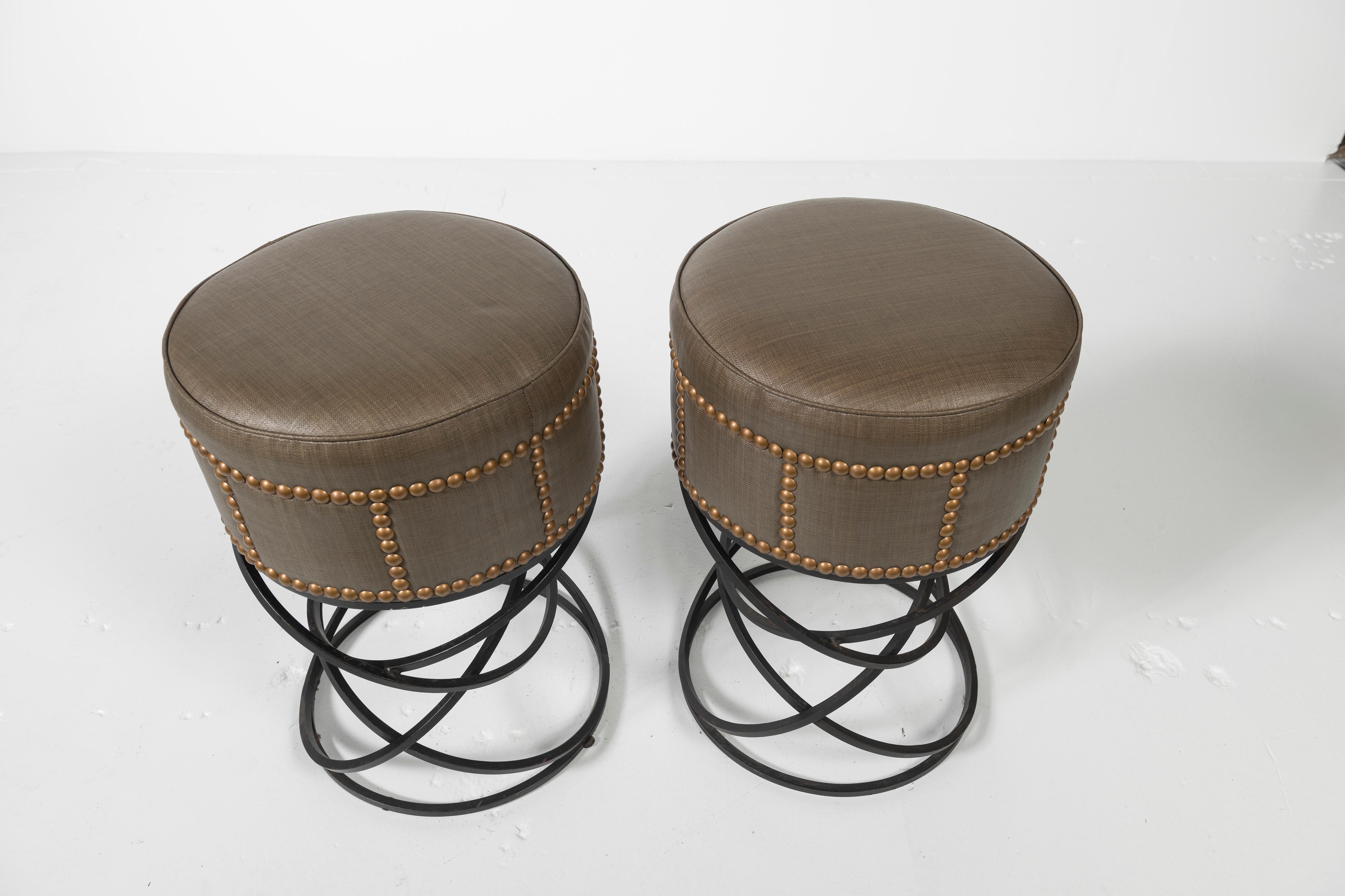 Pair of Modern Studded Leather Bar Stools with a whimsical iron base. Statement pieces for a bar or kitchen counter.