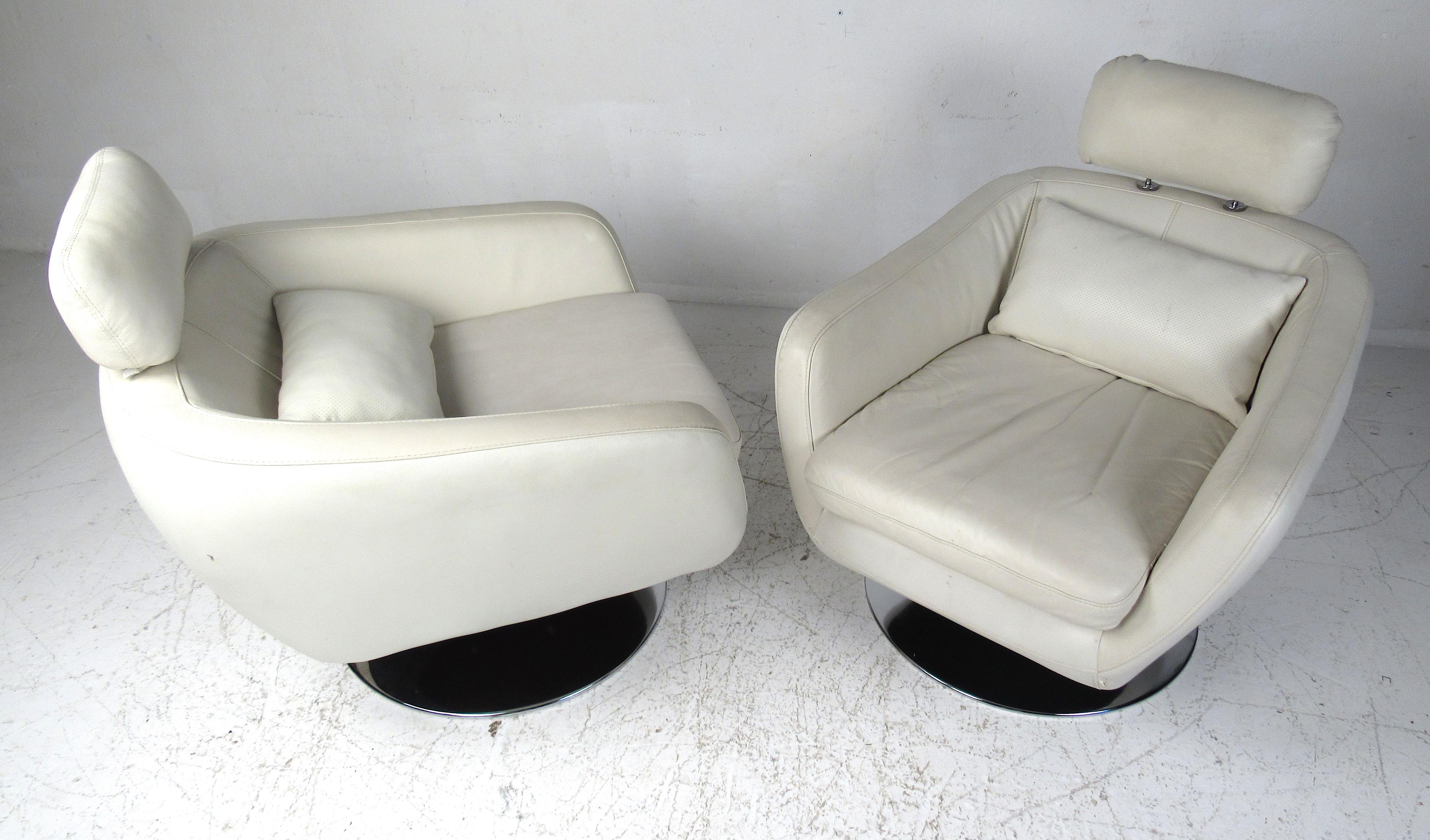 Comfortable contemporary/modern style 360 swivel lounge chairs with white vinyl upholstery and round chrome base. Please confirm item location (NY or NJ) with dealer.