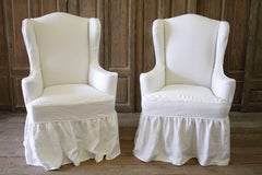Pair of Modern White Linen Slip Covered Wingback Chairs with Ruffle Skirt