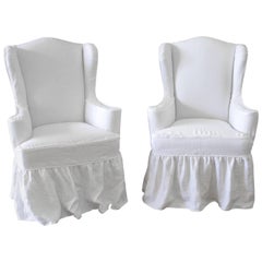 Pair of Modern White Linen Slip Covered Wingback Chairs with Ruffle Skirt