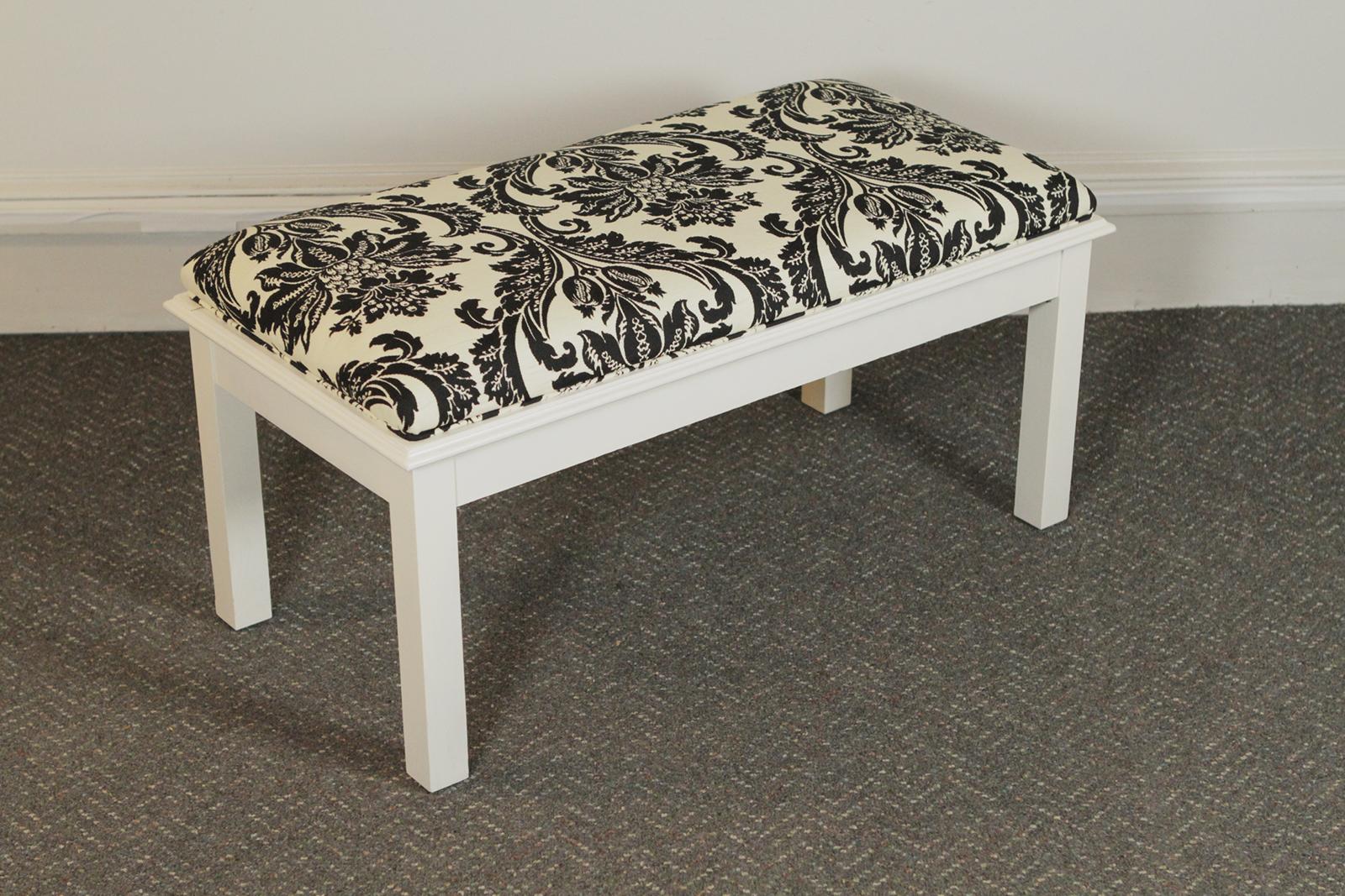Pair of modern white painted wood upholstered benches.
 Dimensions: 36” W x 18” D x 18” H.