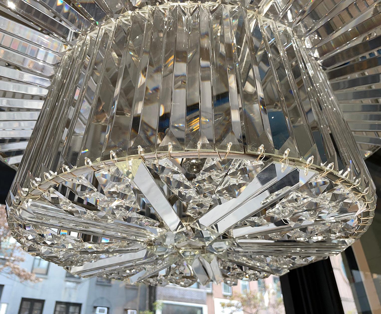 Pair of Moderne Crystal Light Fixtures, Sold Individually In Good Condition For Sale In New York, NY