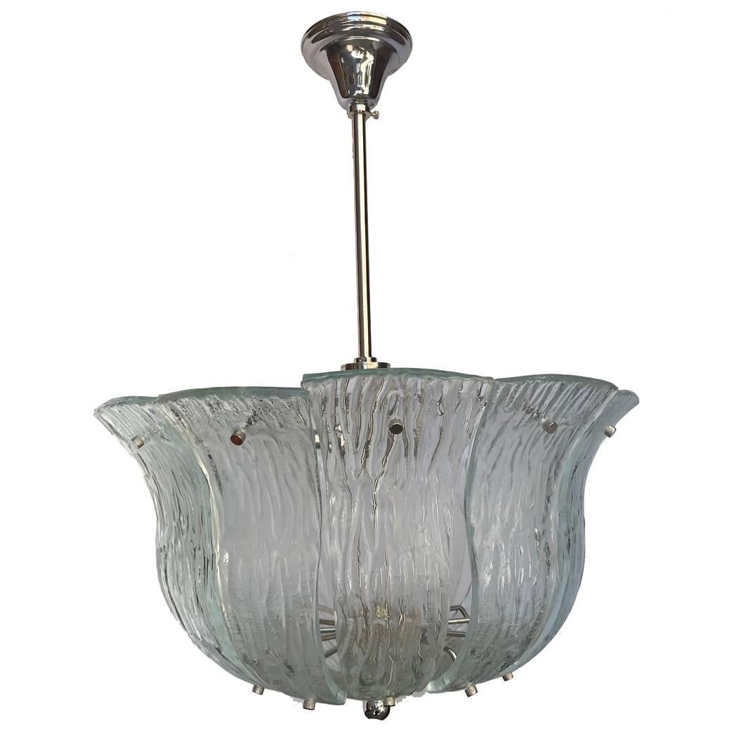 A circa 1950's French molded glass light fixtures with 