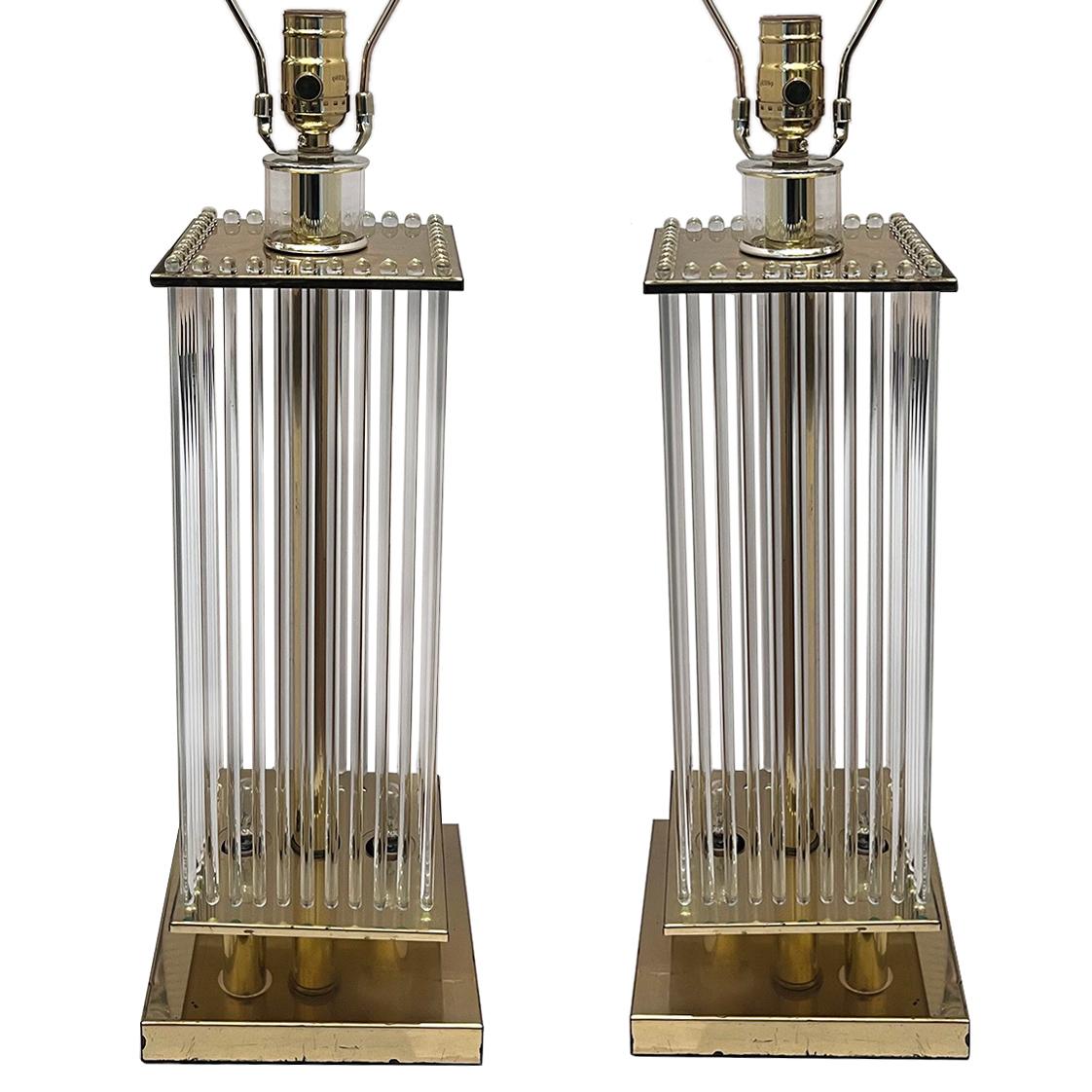 A Pair of circa 1960s' Italian glass rod moderne lamps.

Measurements:
Height of body: 19