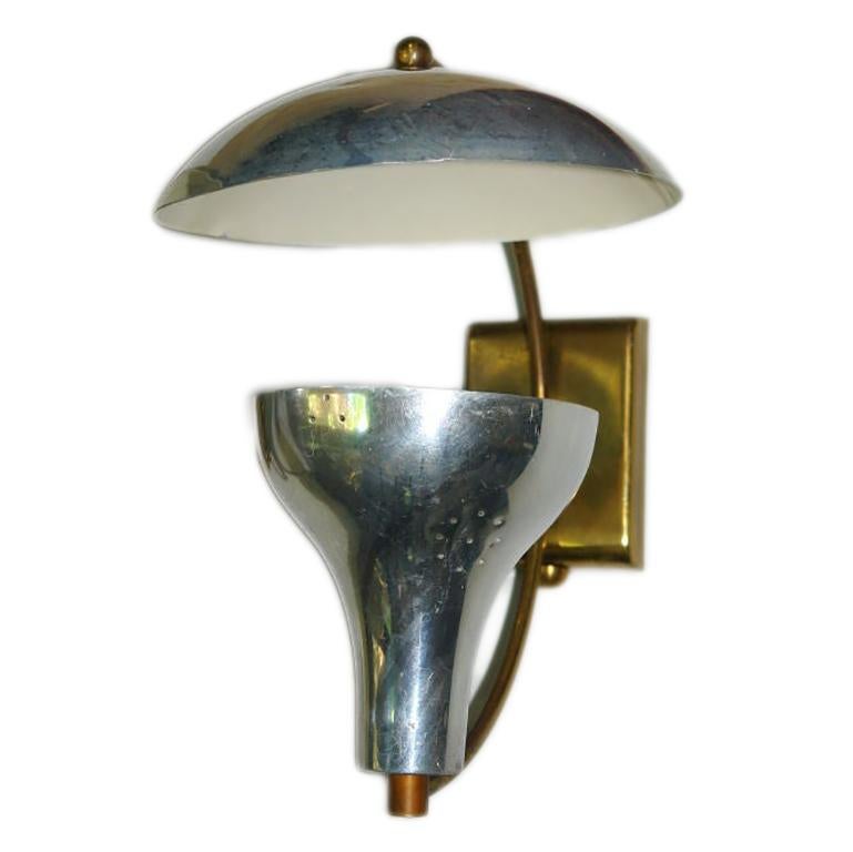 Pair of circa 1960's Italian moderne metal wall sconces with interior lights.
Measurements:
Height: 12