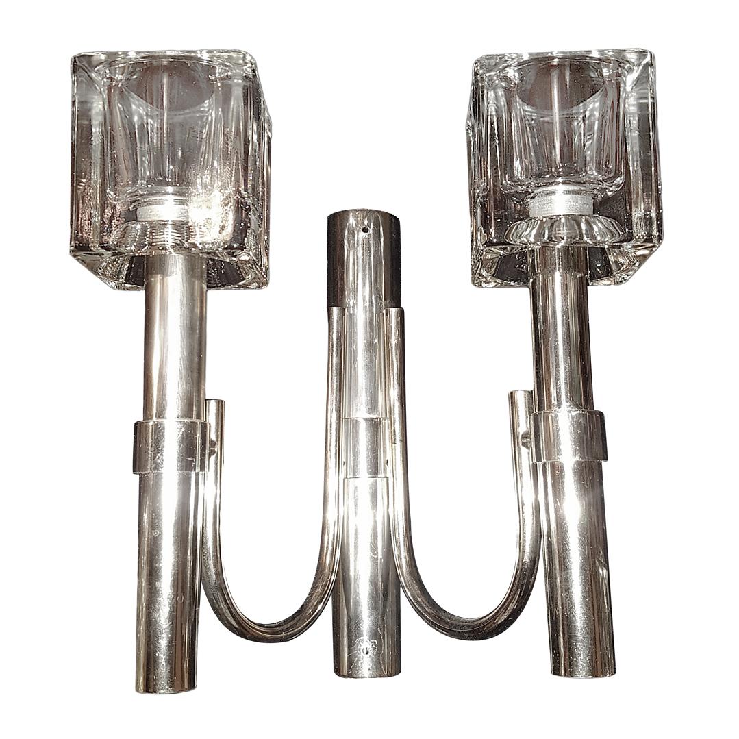 Pair of Italian circa 1960s Moderne style silver plated sconces with molded glass insets. 

Measurements:
Height 10
