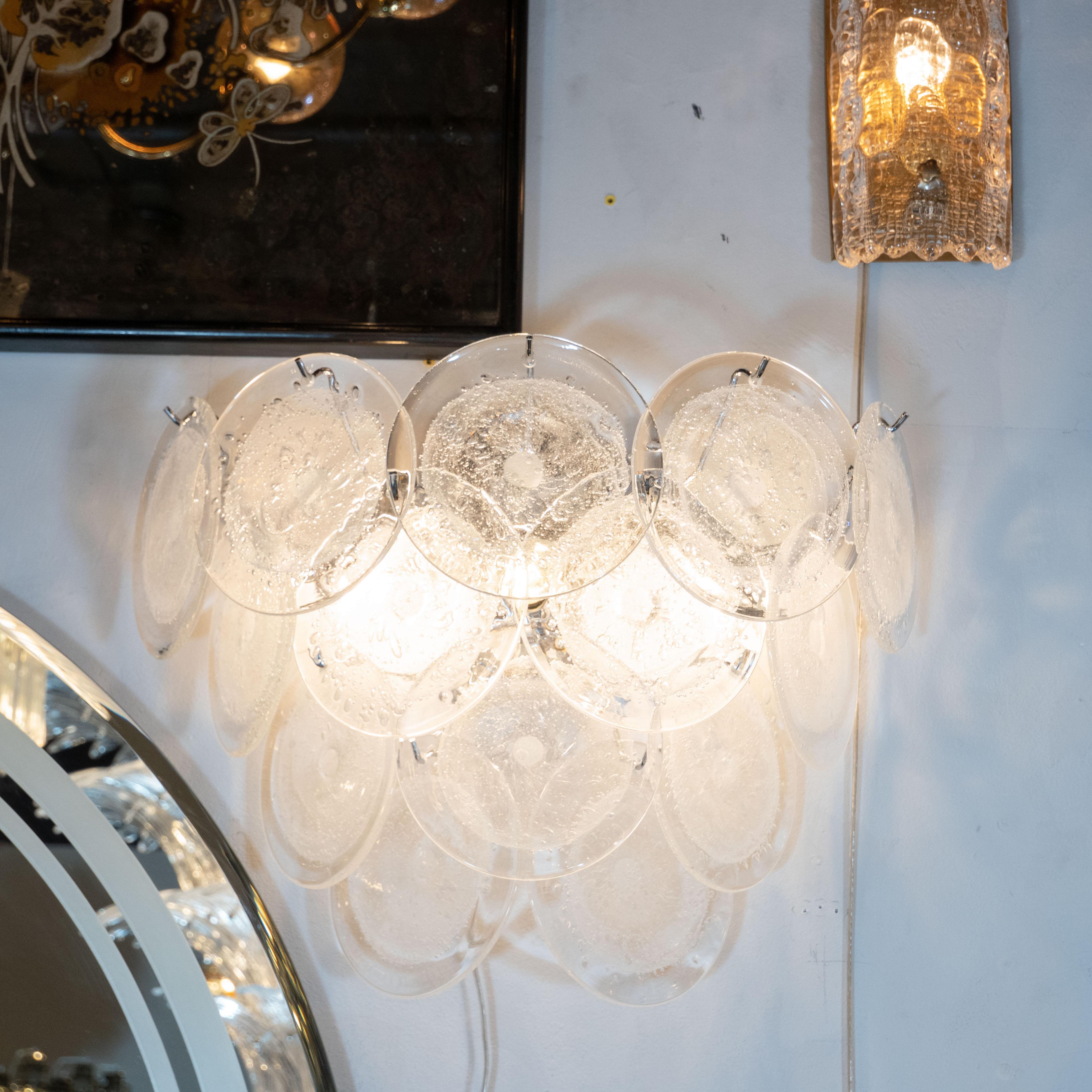 This beautiful pair of modernist 14-disc vistosi sconces were made exclusively for High Style Deco by our atelier in Murano, Italy- the island off the coast of Venice, renowned for centuries for its superlative glass production. Realized in the