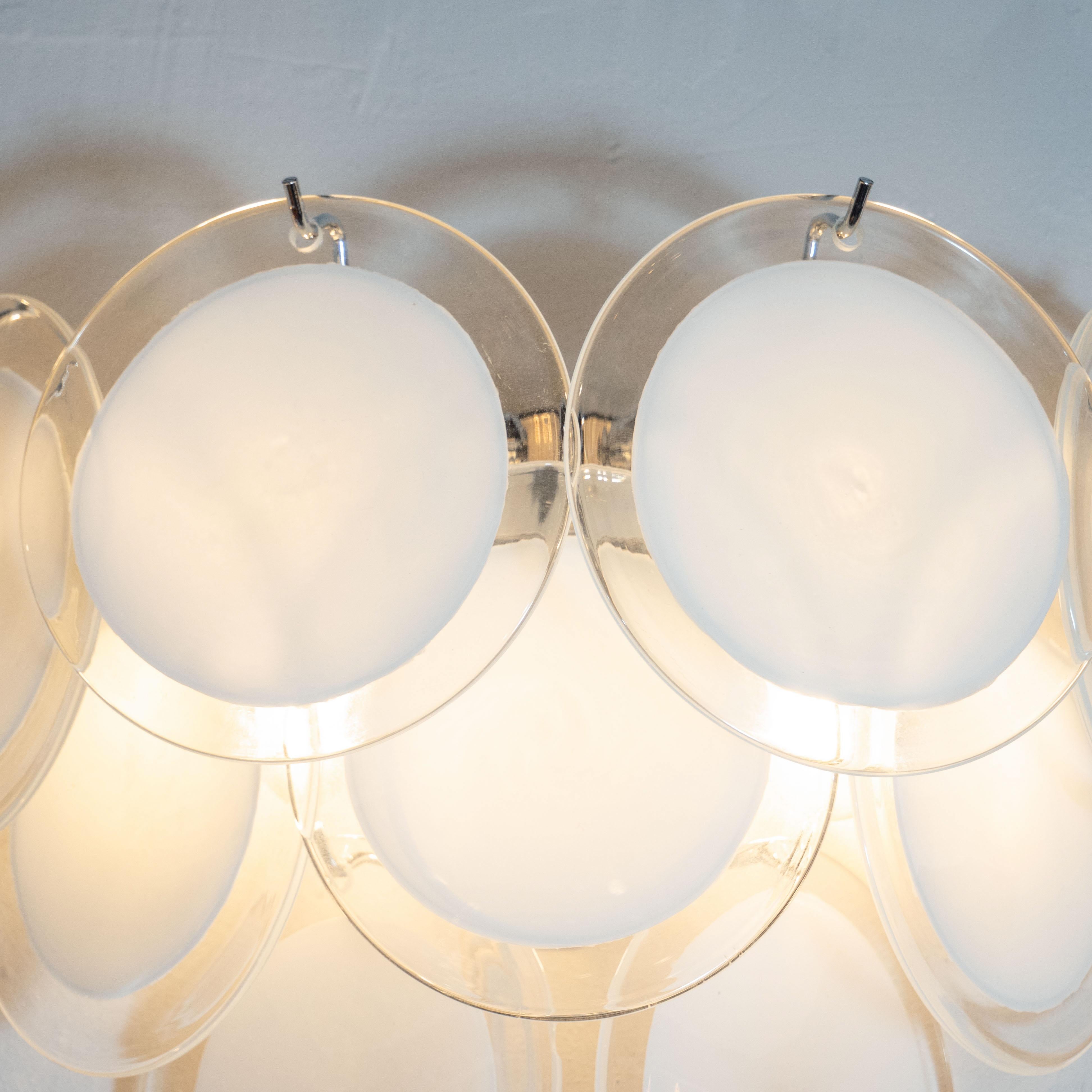 Italian Pair of Modernist 9-Disc Hand Blown Murano White and Translucent Glass Sconces For Sale