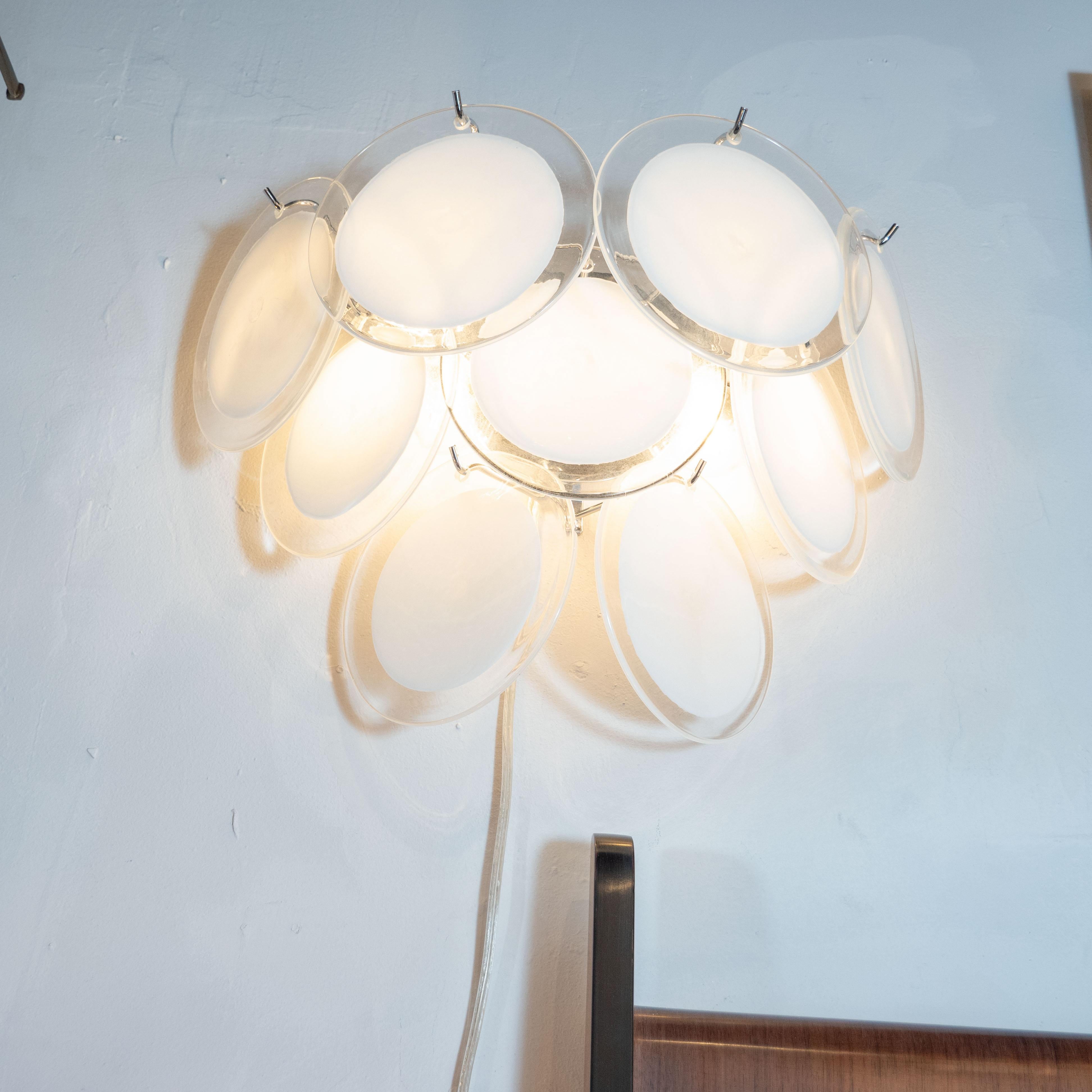 Pair of Modernist 9-Disc Hand Blown Murano White and Translucent Glass Sconces In Excellent Condition For Sale In New York, NY