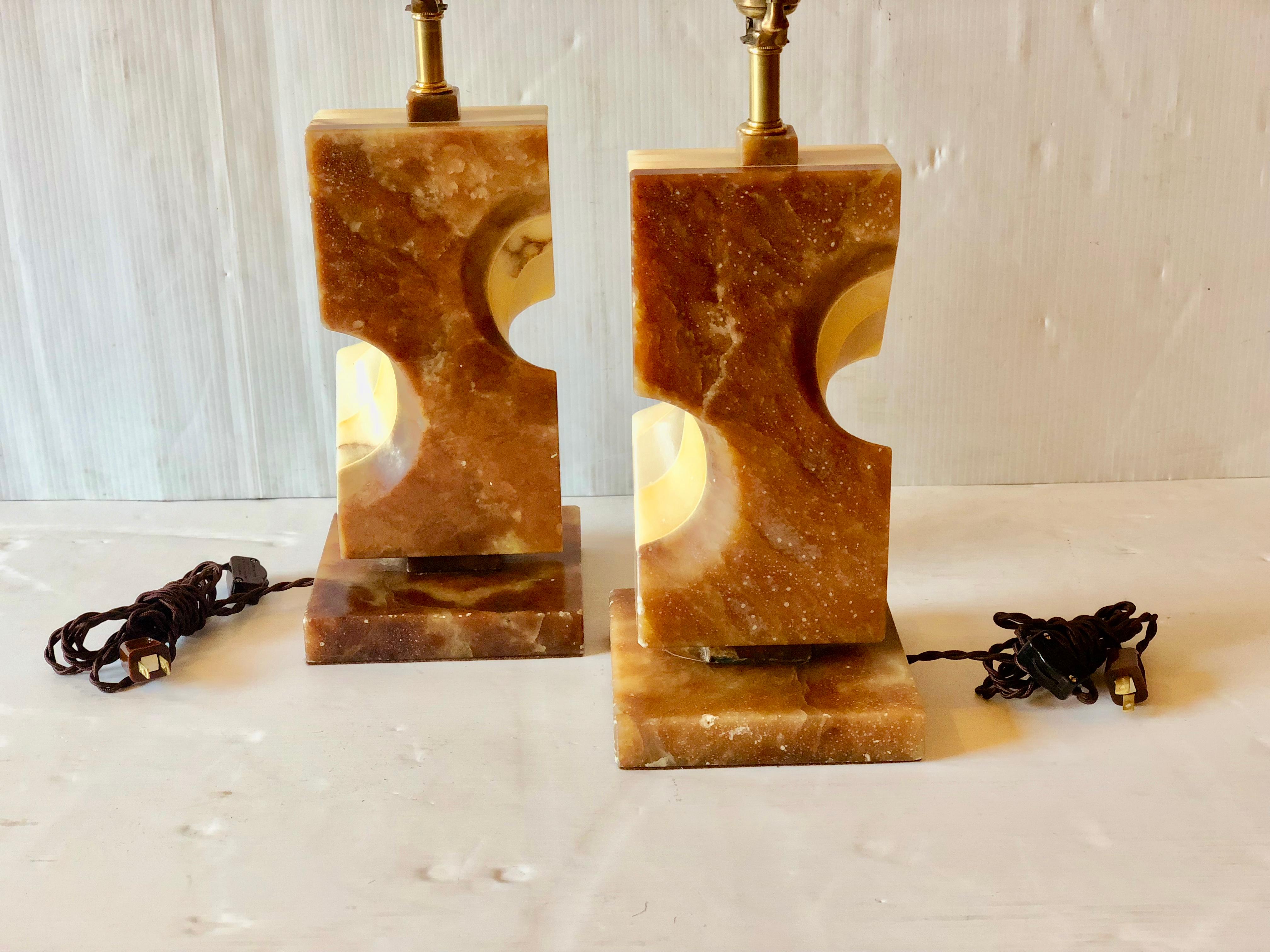 Majestic pair of polished onyx table lamps freshly rewired. Lampshades not included.