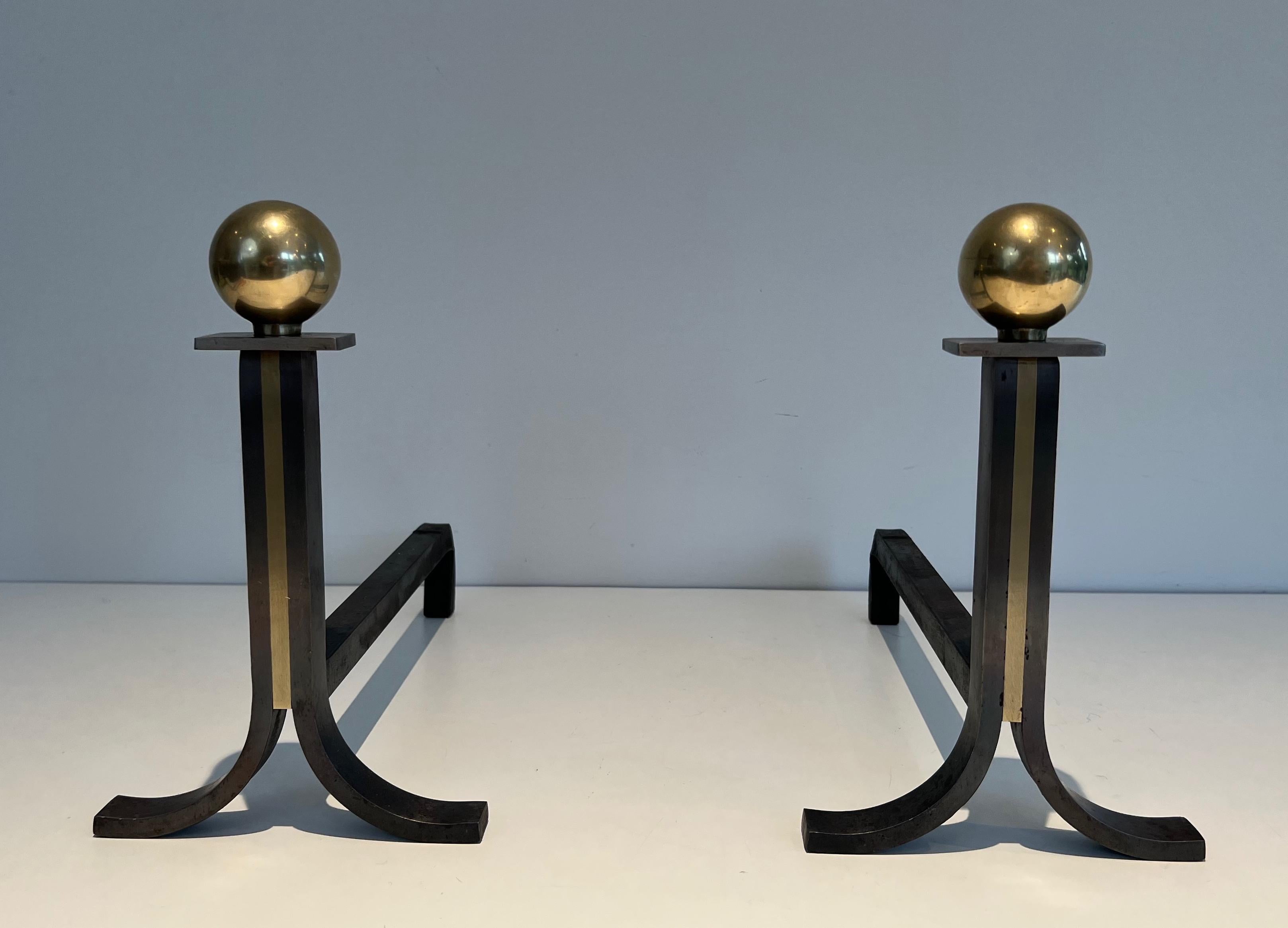 Mid-Century Modern Pair of Modernist Andirons in the Style of Jacques Adnet For Sale