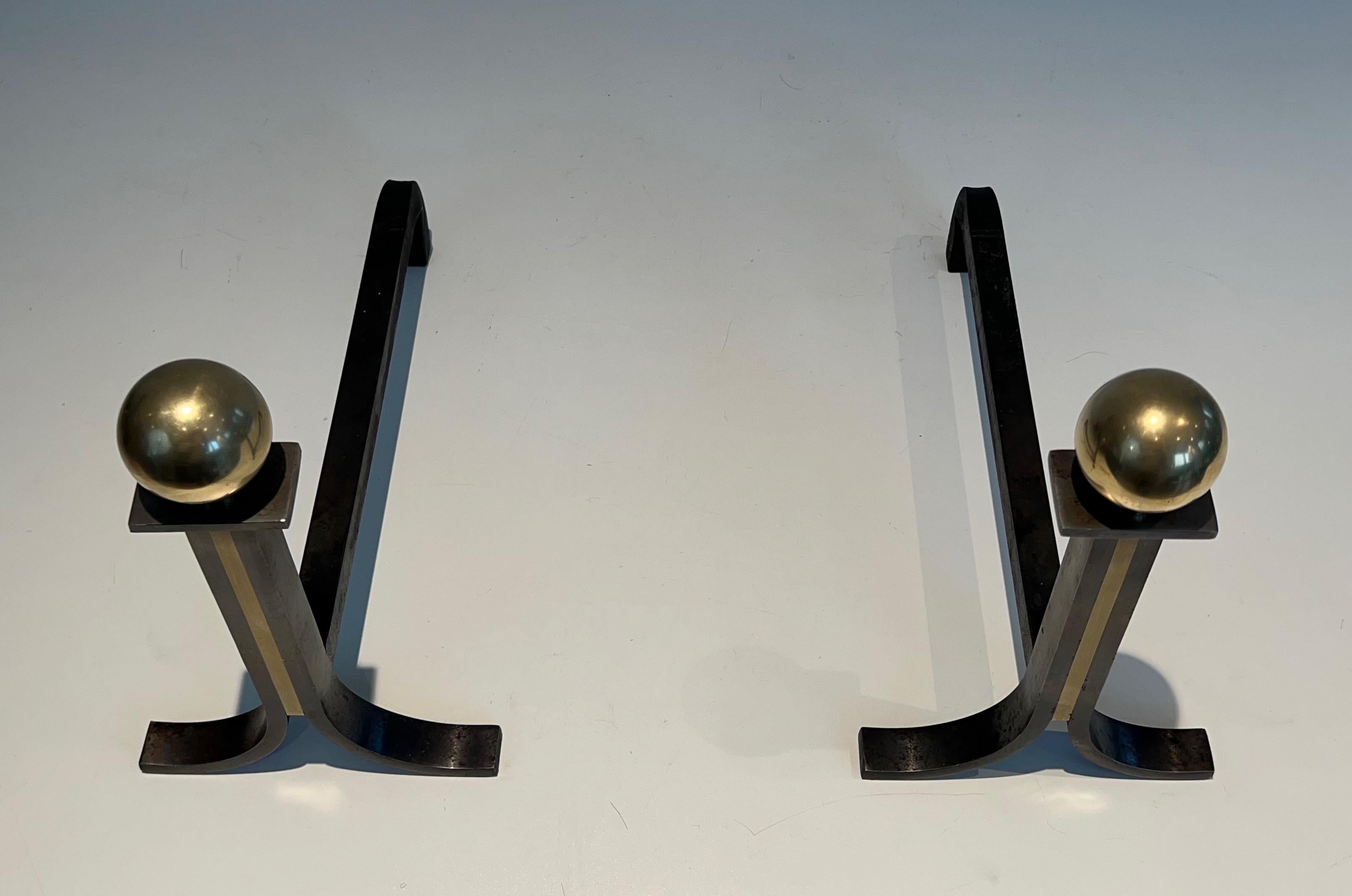 Pair of Modernist Andirons in the Style of Jacques Adnet In Good Condition For Sale In Marcq-en-Barœul, Hauts-de-France