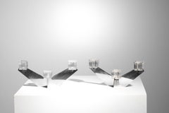 Pareja de candelabros modernistas de cristal y metal cromado de los años 40