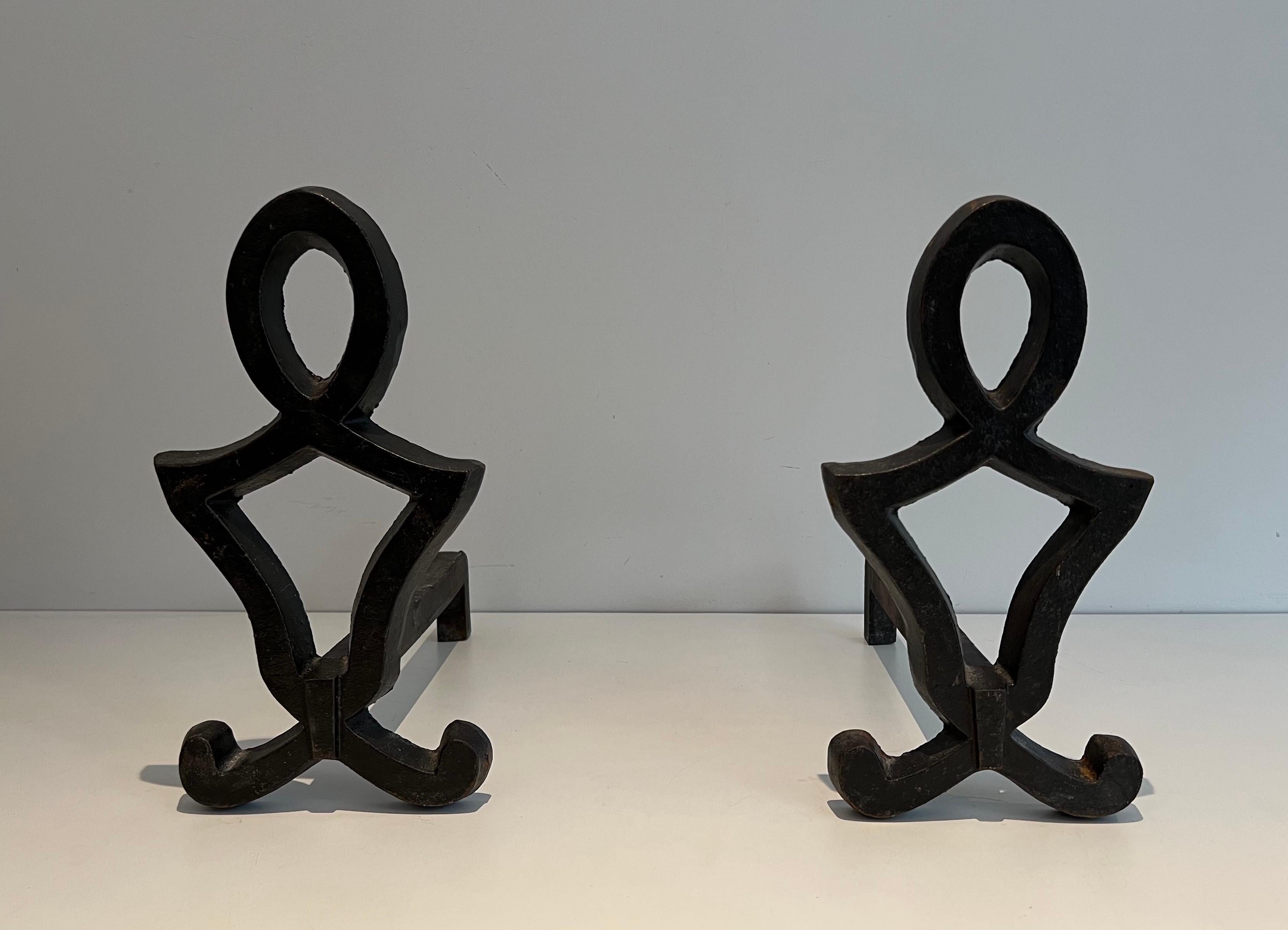 Mid-Century Modern Pair of Modernist Cast Iron and Wrought Iron Andirons by Raymond Subes For Sale