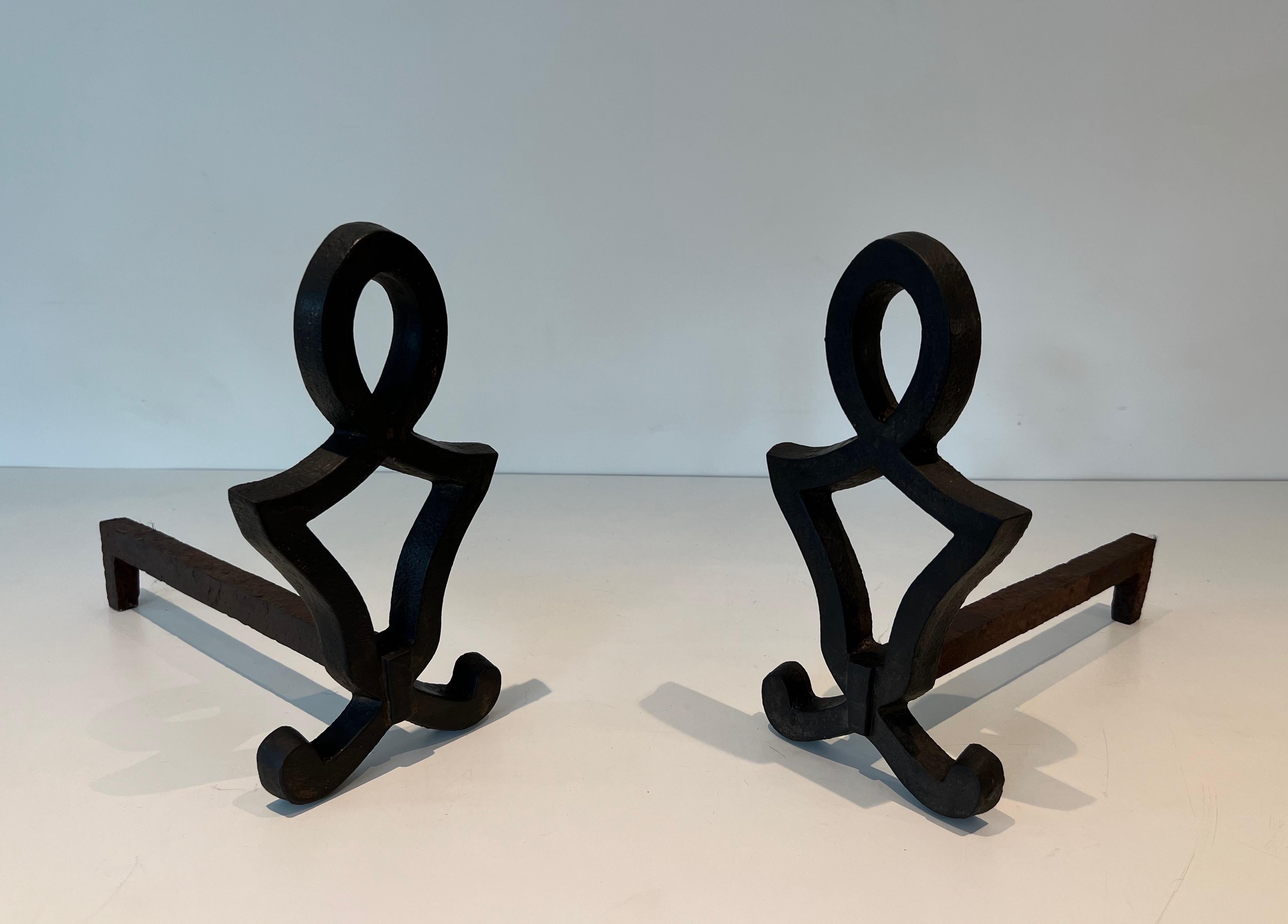 French Pair of Modernist Cast Iron and Wrought Iron Andirons by Raymond Subes For Sale