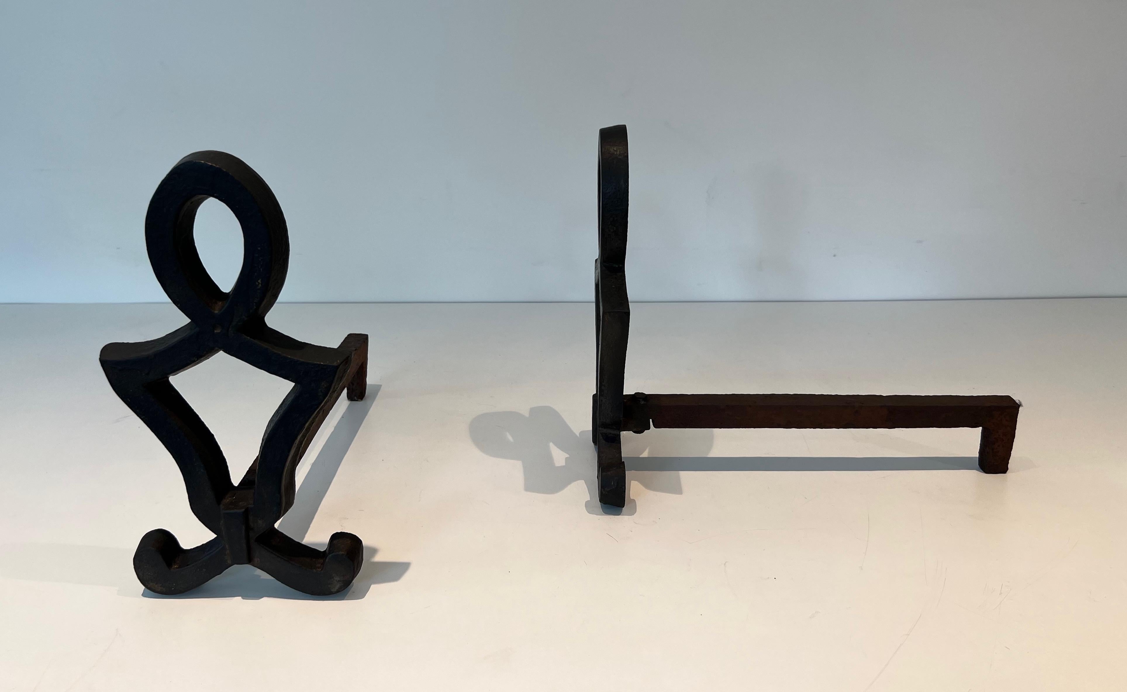 Pair of Modernist Cast Iron and Wrought Iron Andirons by Raymond Subes In Good Condition For Sale In Marcq-en-Barœul, Hauts-de-France